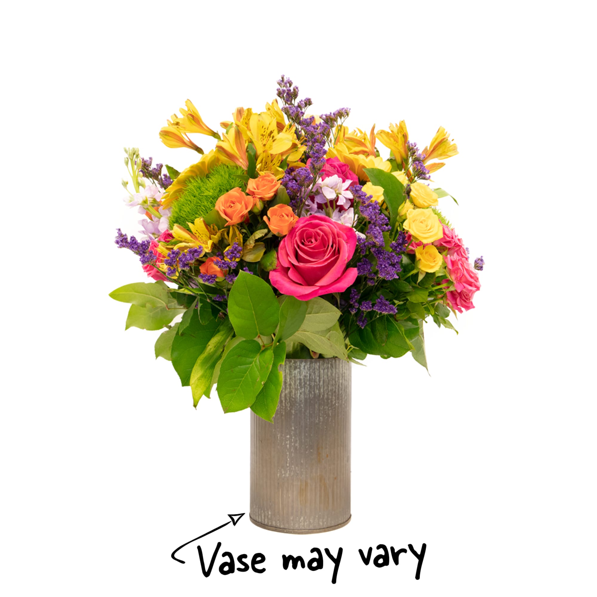 Bright mixed bouquet of pink roses, yellow blooms, and purple accents in a tall cylinder vase