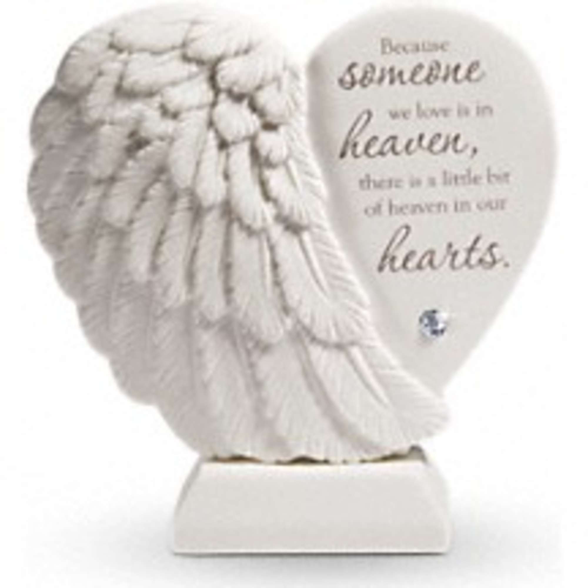 White angel wing memorial plaque with a sympathy message on a base