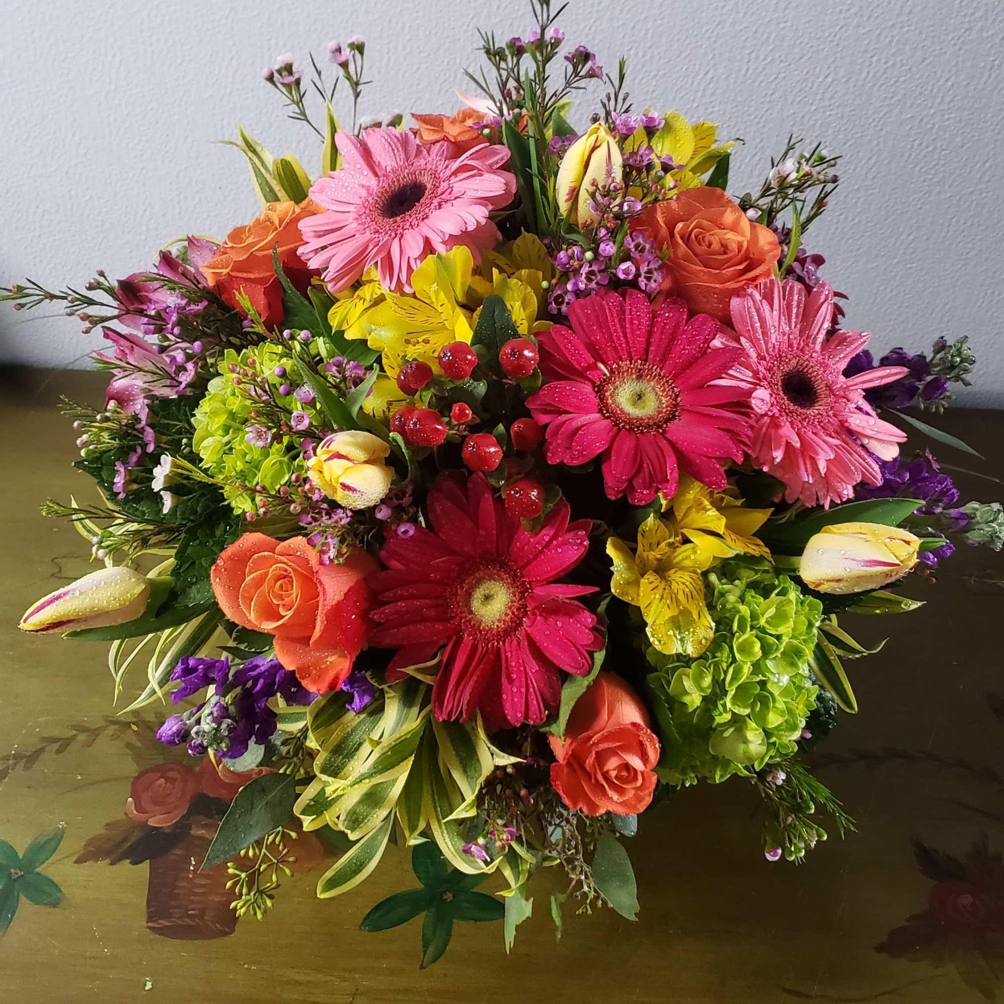 Elegant 8" clear  glass bowl, filled with seasonal flowers such as, photo 2 of 3