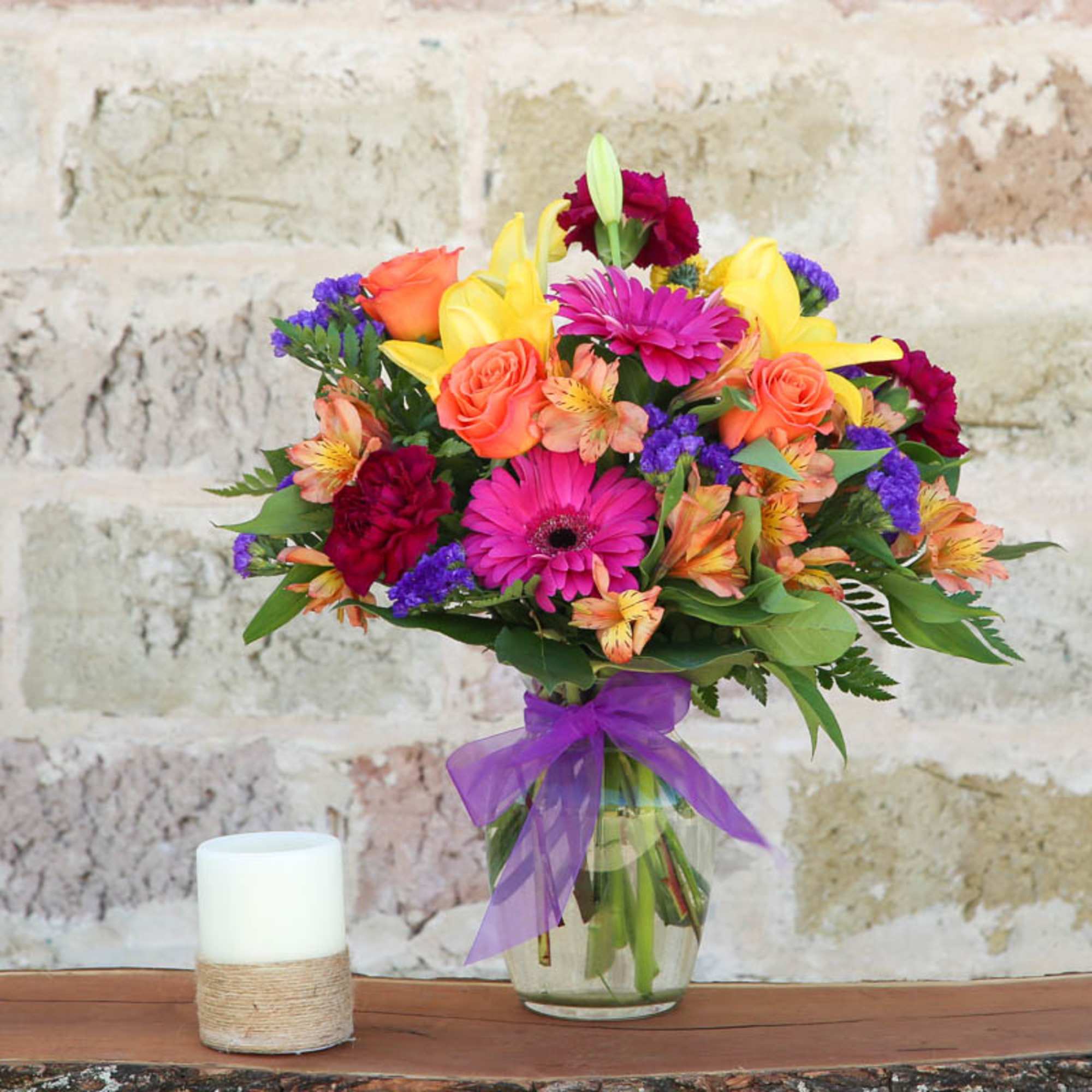 Colorful mixed bouquet in a glass vase with a purple ribbon, photo 2 of 2