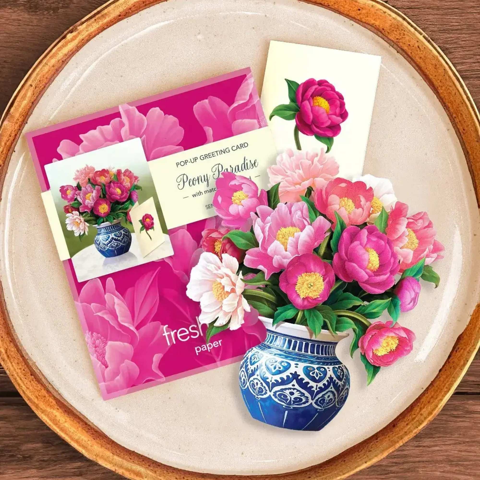 Pop-up greeting card with pink peonies in a blue vase