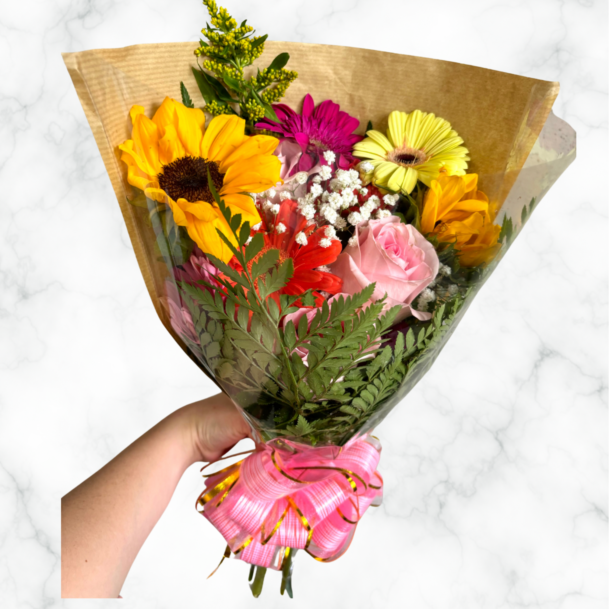 Mixed flowers bouquets, mix of flowers such as sunflowers, carnations, gerberas, roses