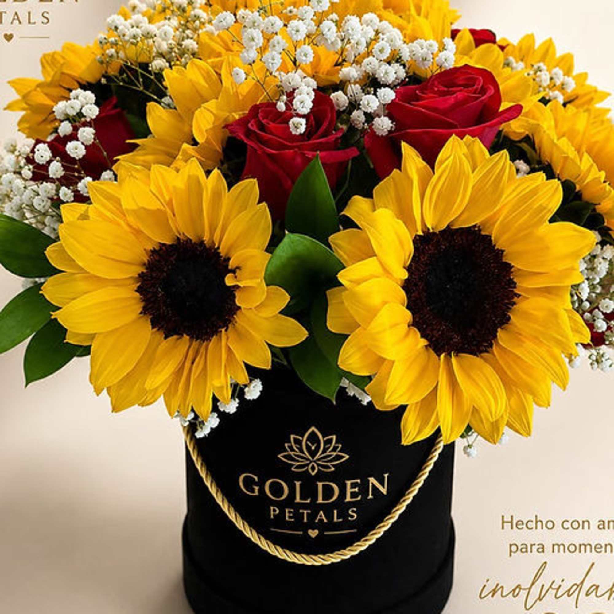 Bouquet of yellow sunflowers and red roses in a black hatbox