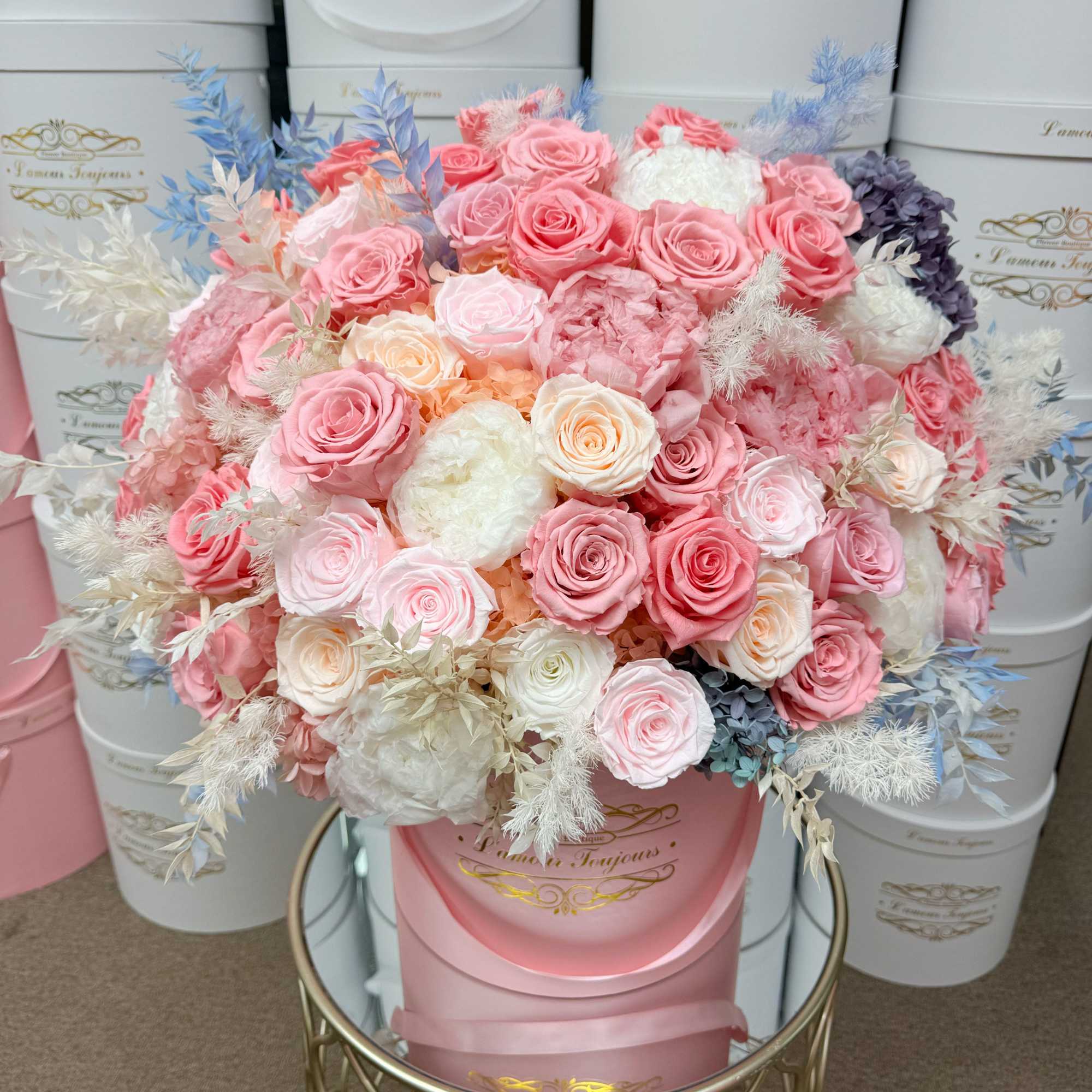 Exquisite mix of everlasting roses, everlasting peonies and preserved seasonal flowers in