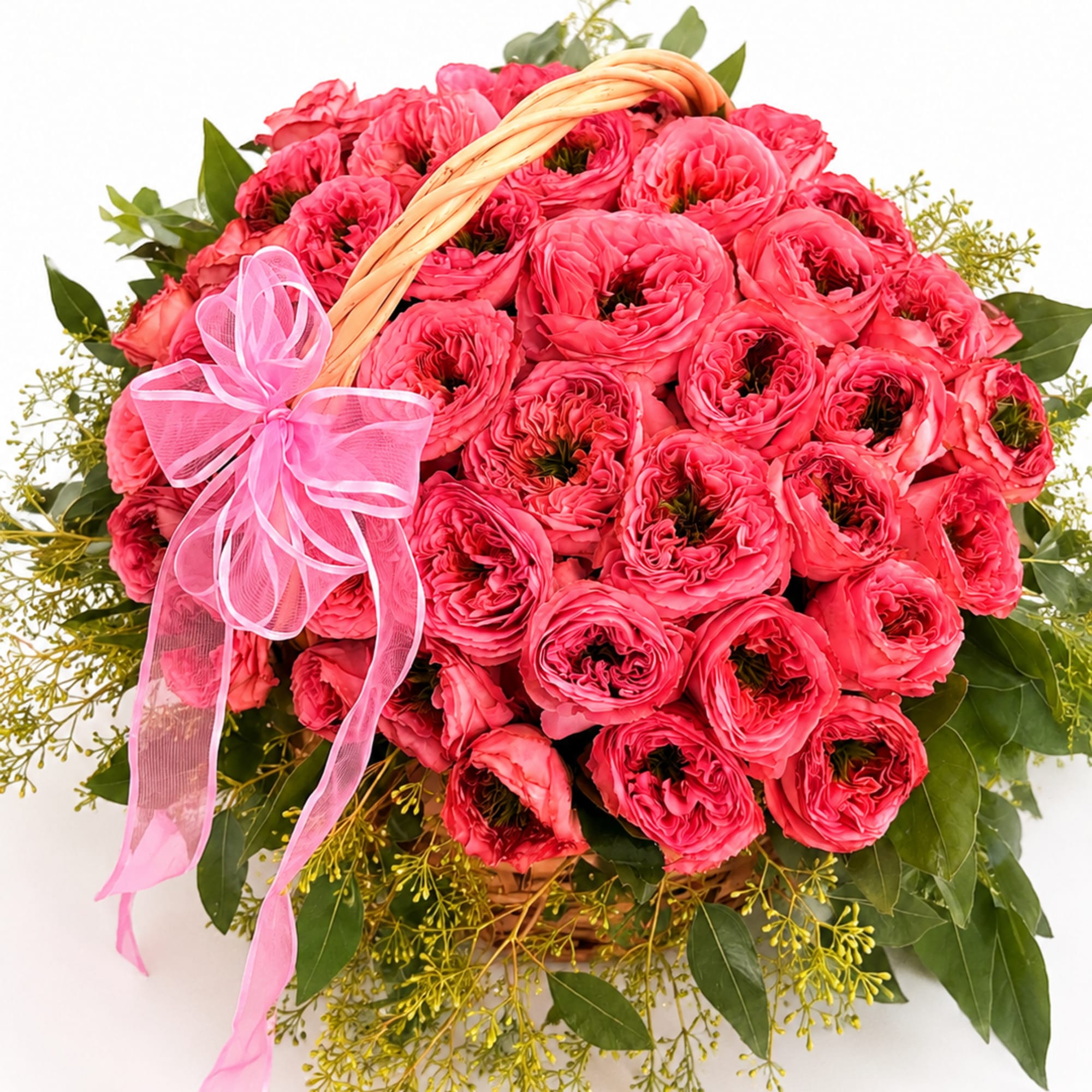 Basket of bright pink roses with a pink ribbon bow