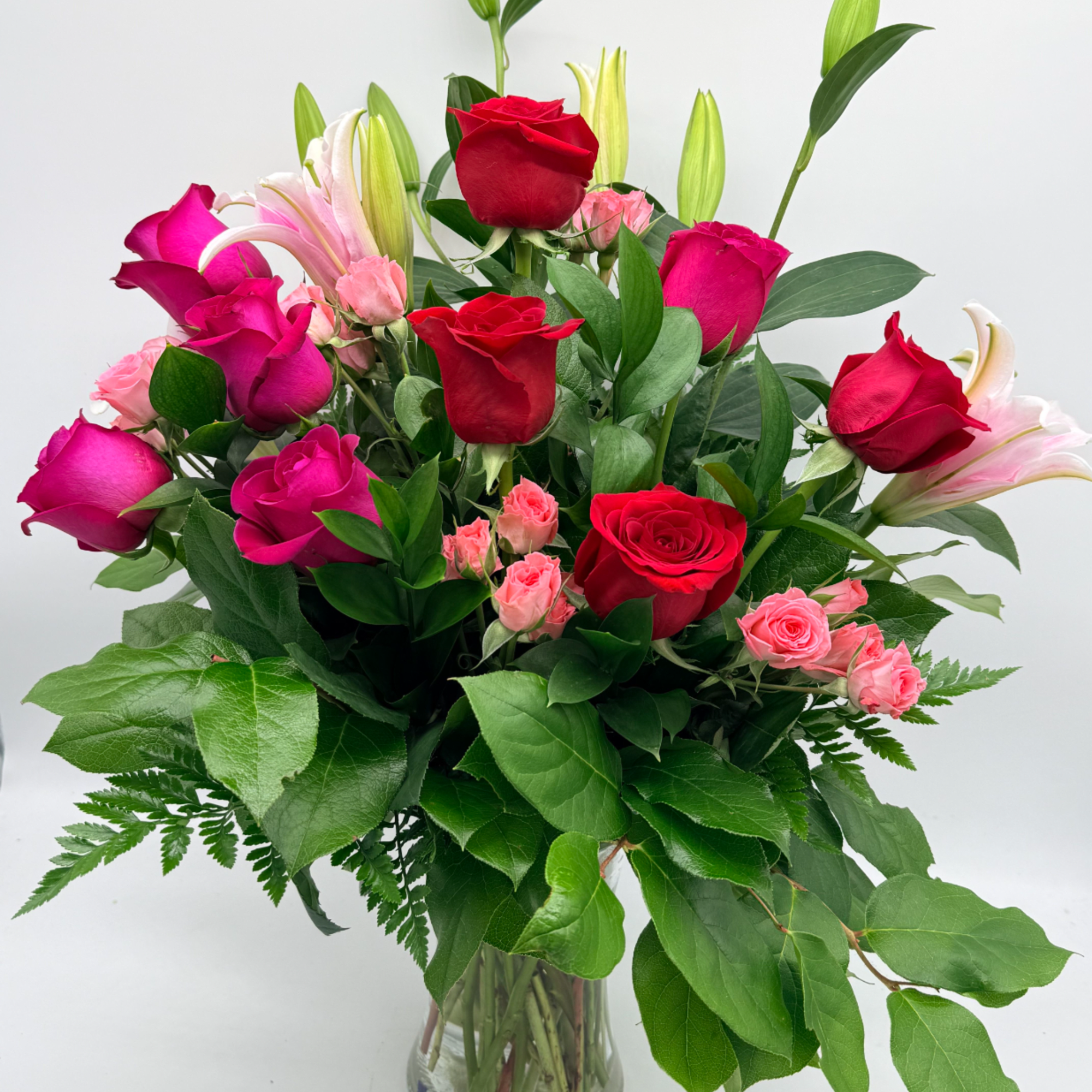 A dreamy mix of passionate reds and sweet pink florals designed to