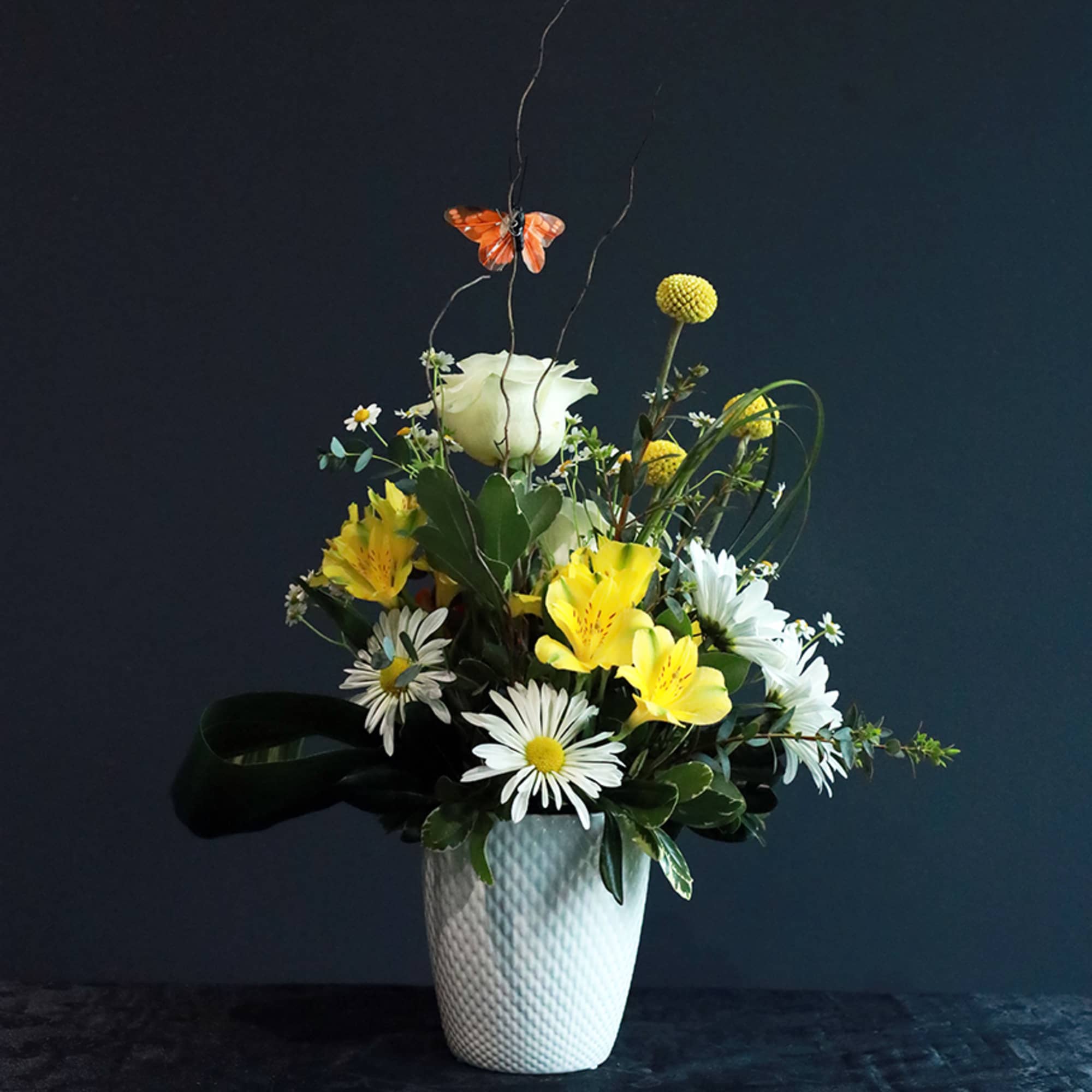  The "A Butterfly's Journey" arrangement is a thoughtful and uplifting choice