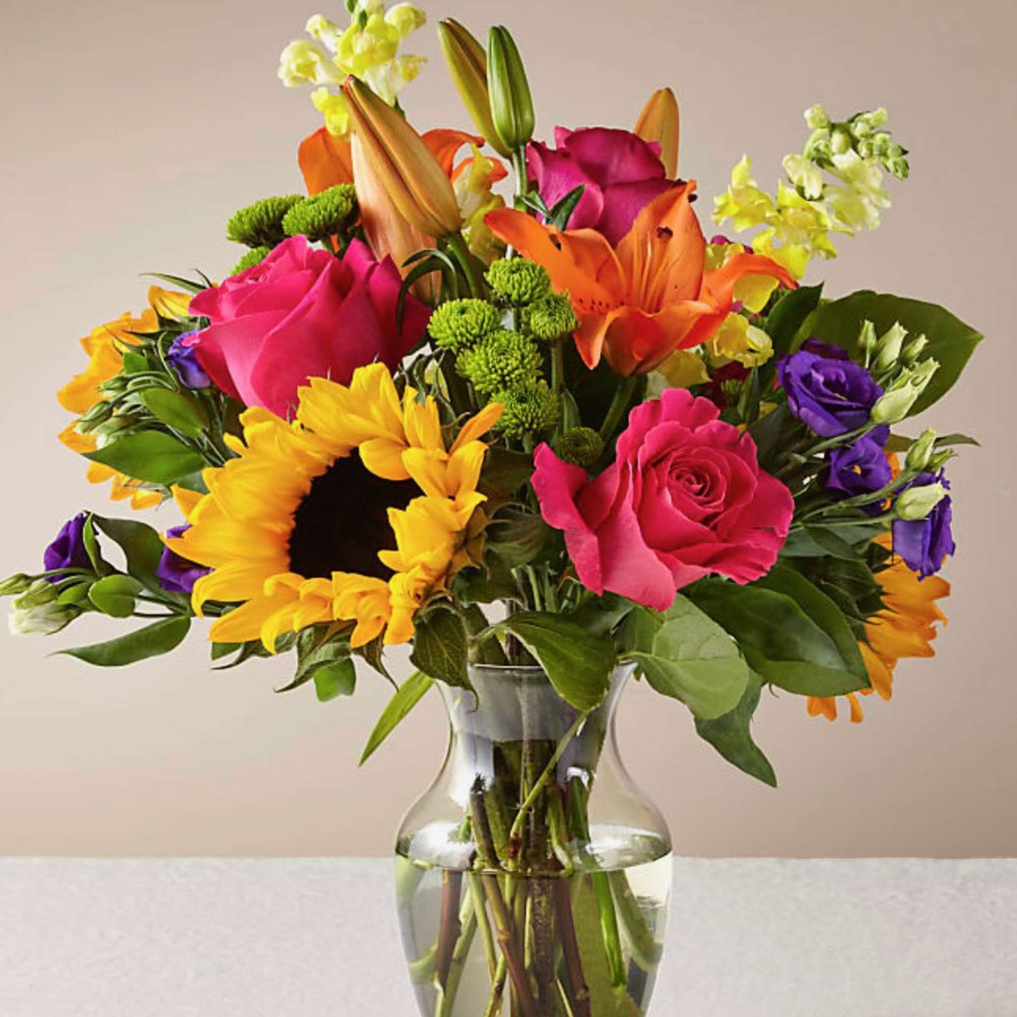 Colorful mixed bouquet in a clear glass vase