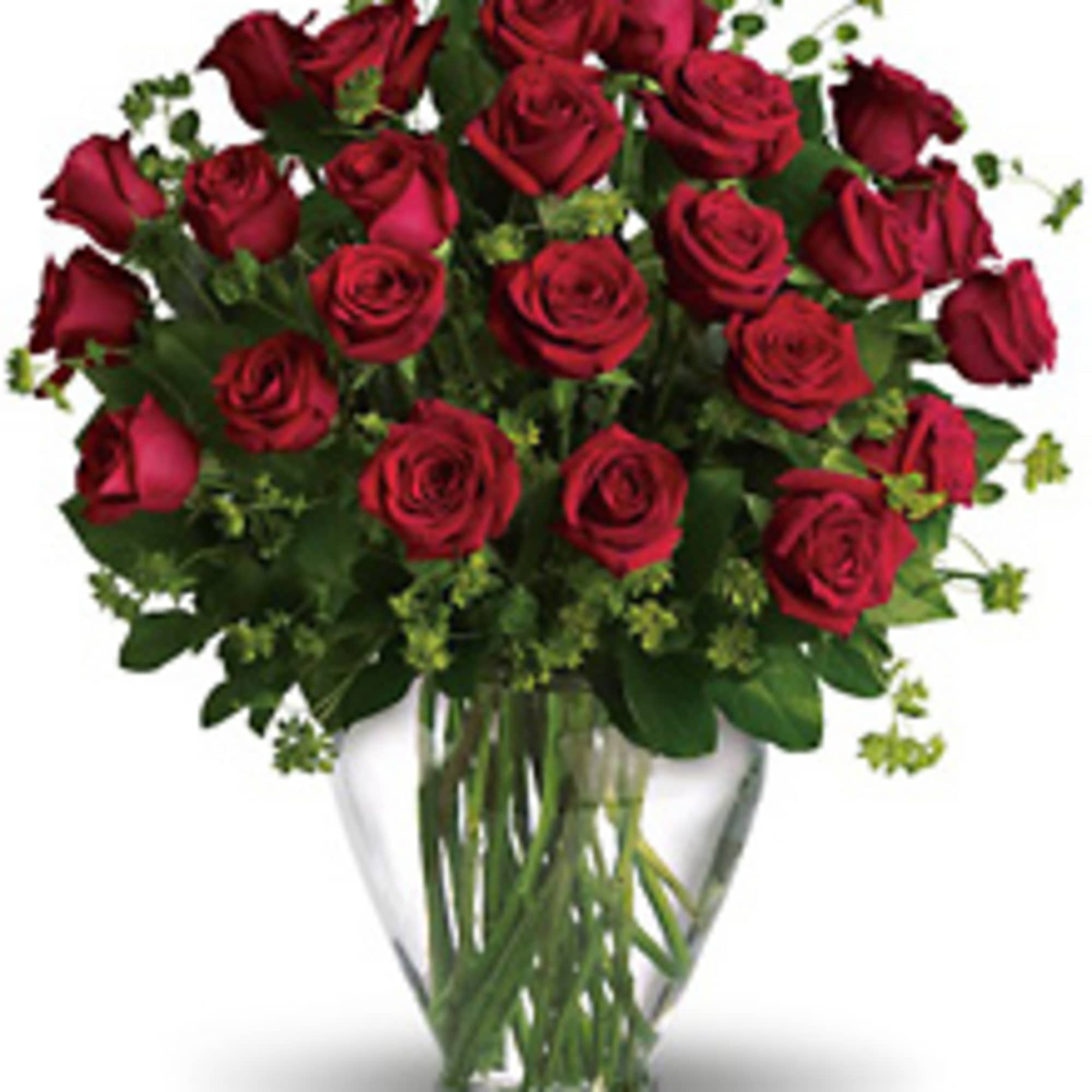 Red roses arranged in a clear glass vase