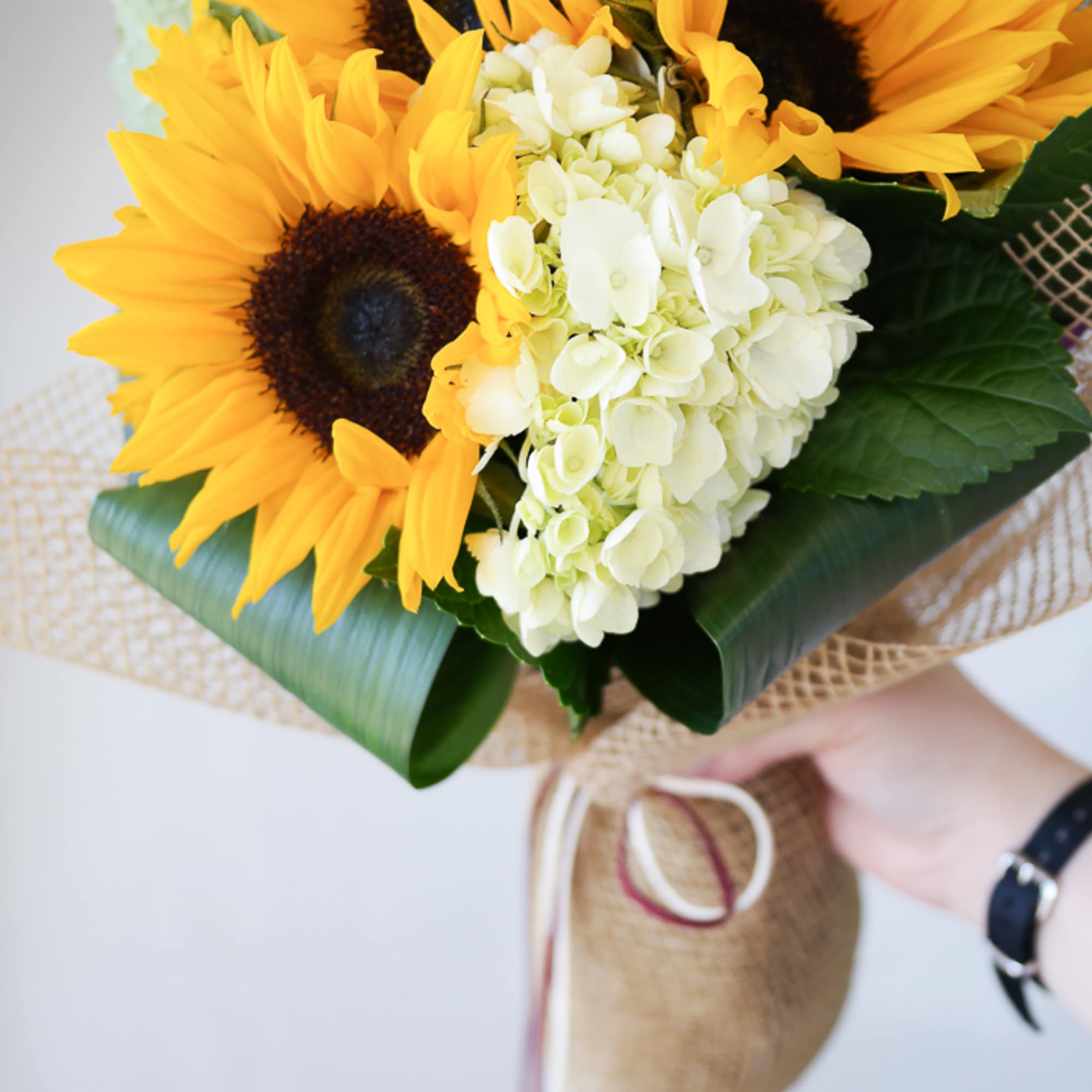 This simple yet lovely sunflower bouquet is perfect for any occasion. 