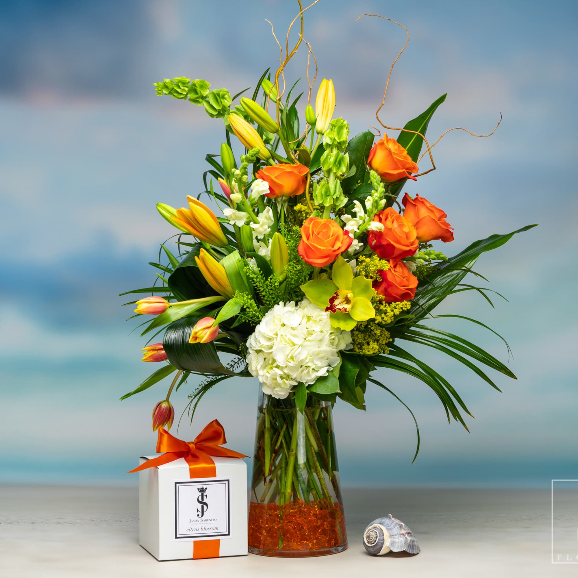 Citrus Summer Blossom Citrus Summer Blossom is an elegant arrangement with Bells