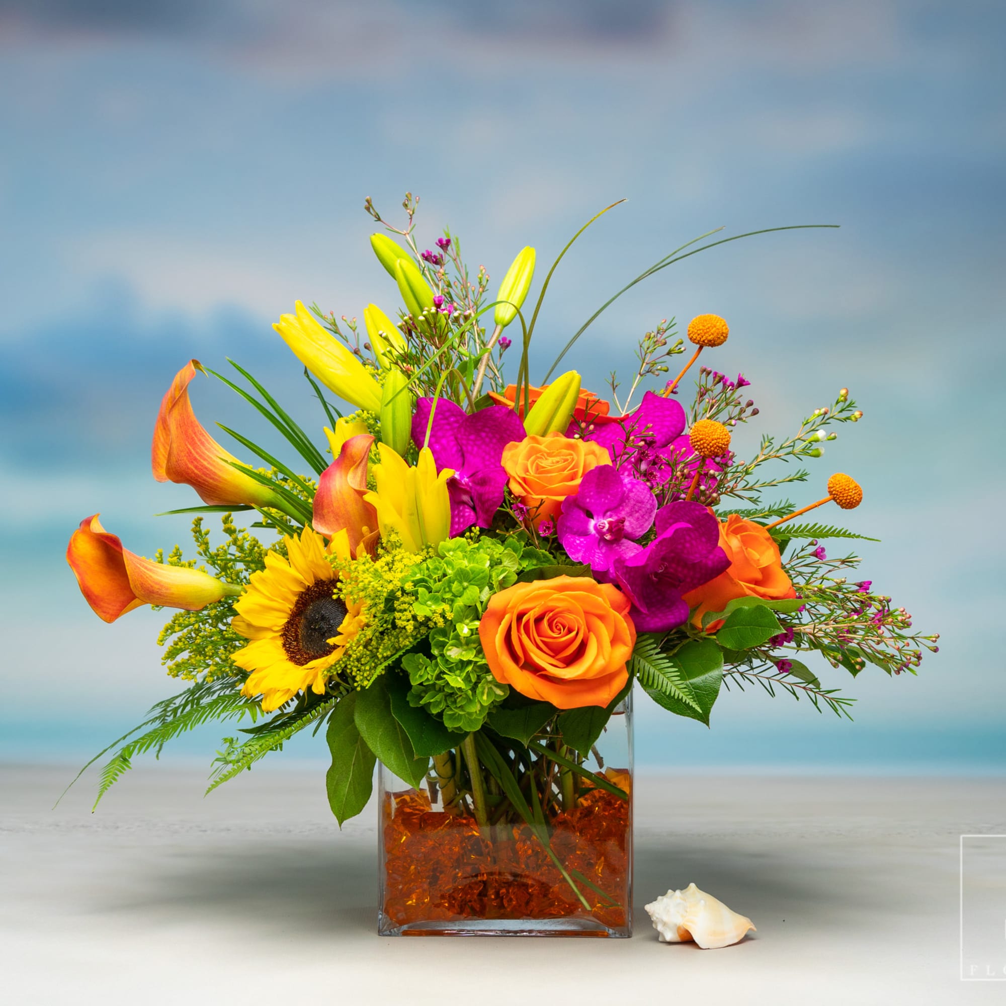 Wake up to a beautiful bouquet of Hydrangeas, Lilies, Orchids, Sunflowers, and