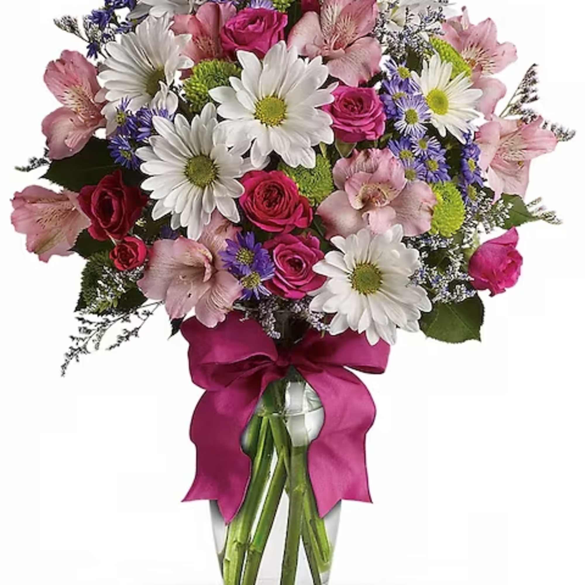 Bouquet of pink roses, white daisies, and alstroemeria in a glass vase