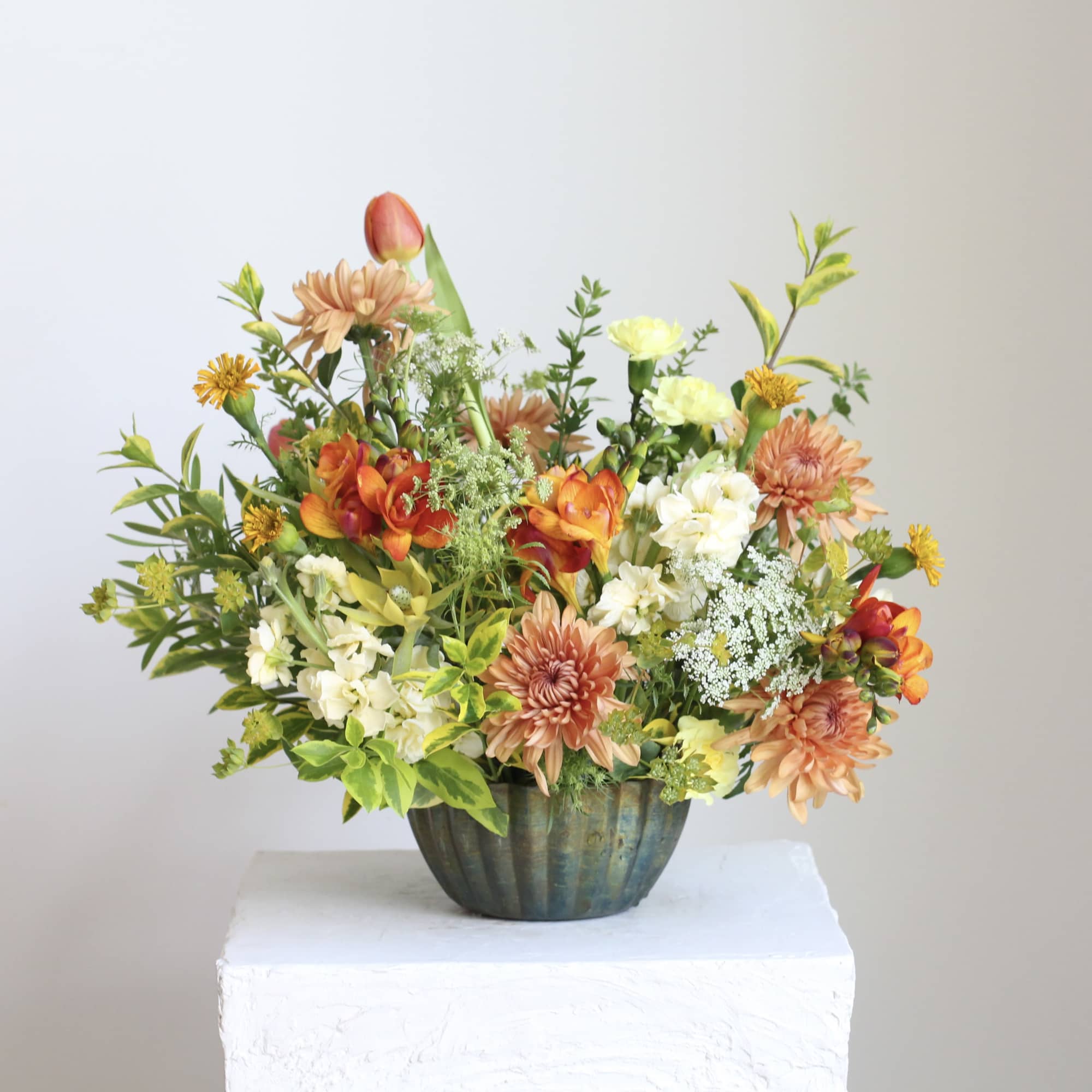 Meet &ldquo;Spring Oasis,&rdquo; a vibrant floral arrangement blending gold, fiery orange, and, photo 3 of 4