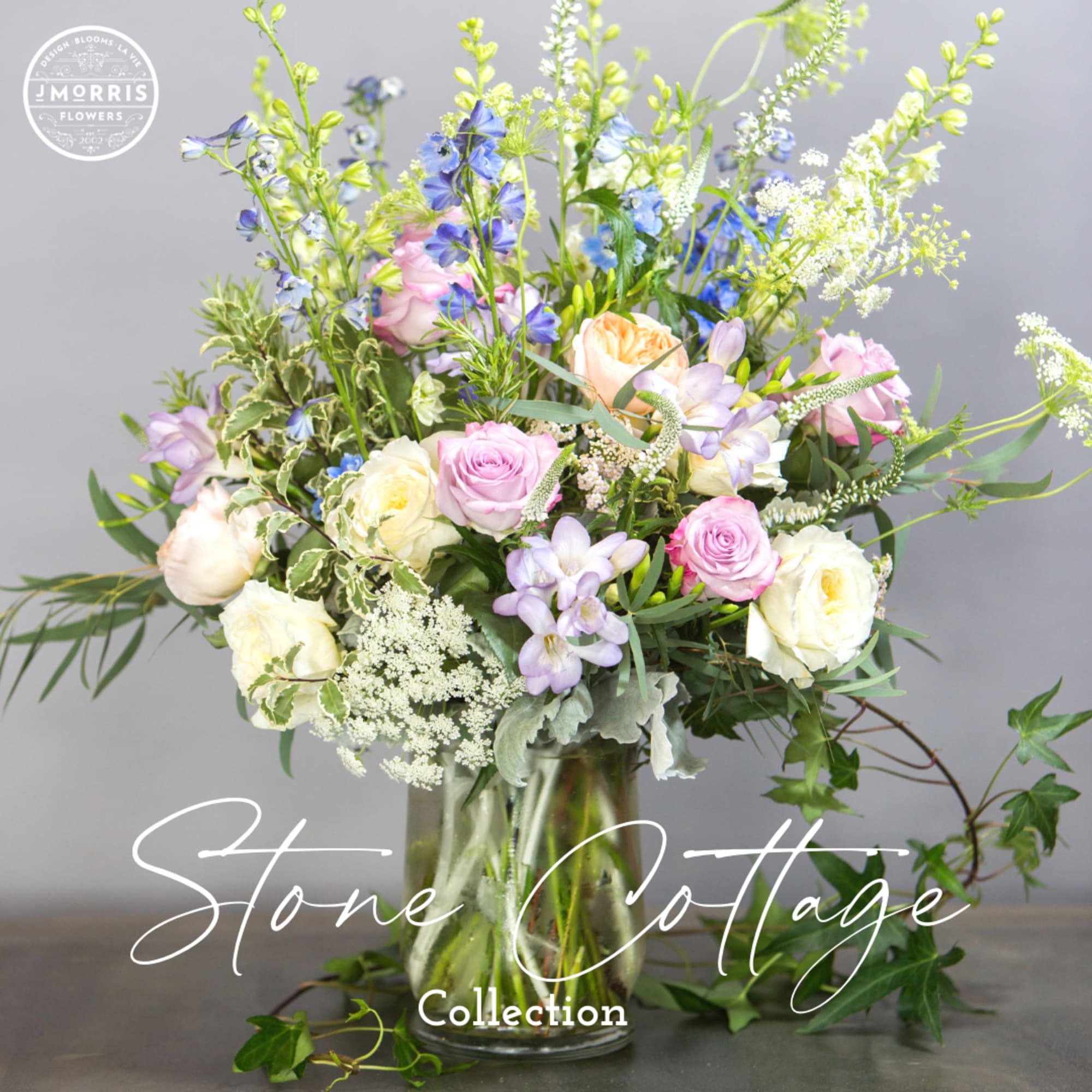 Mixed pastel bouquet in a clear glass vase