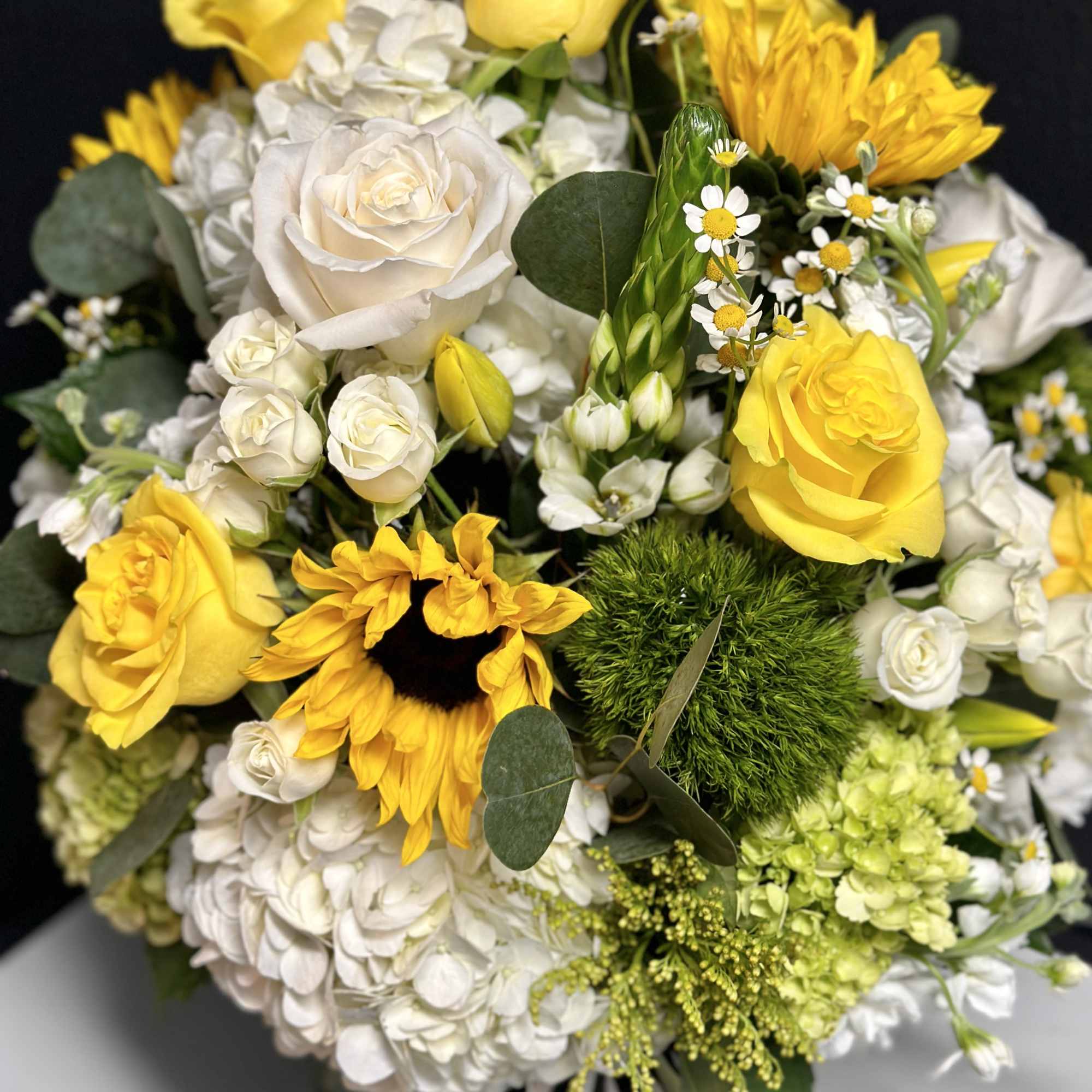 A lavish seasonal arrangement, with our most premium floral varieties in shades, photo 2 of 2