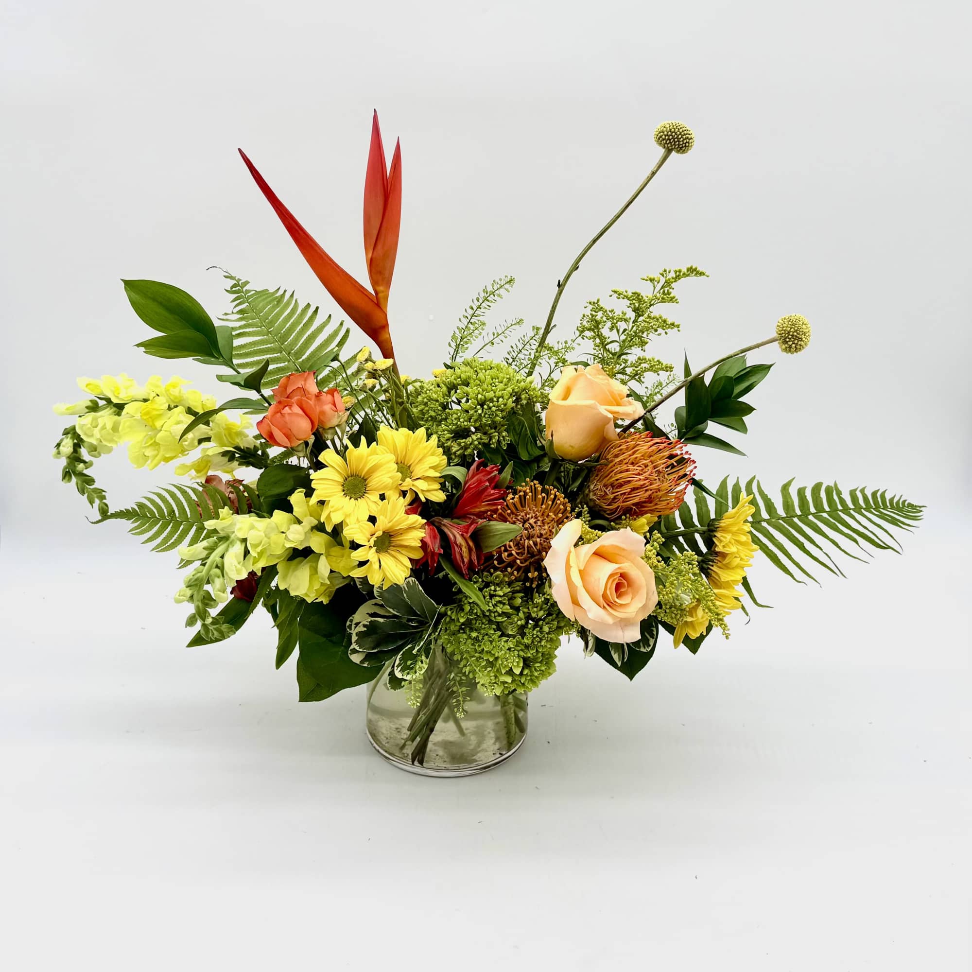 Citrus Zest is a bright, cheerful arrangement inspired by the fresh colors