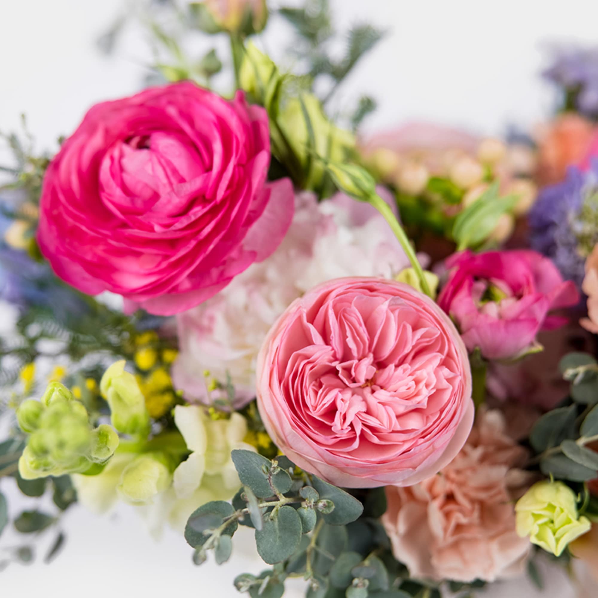 Soft, romantic, and effortlessly elegant, Pretty in Pastels is a lush garden-style