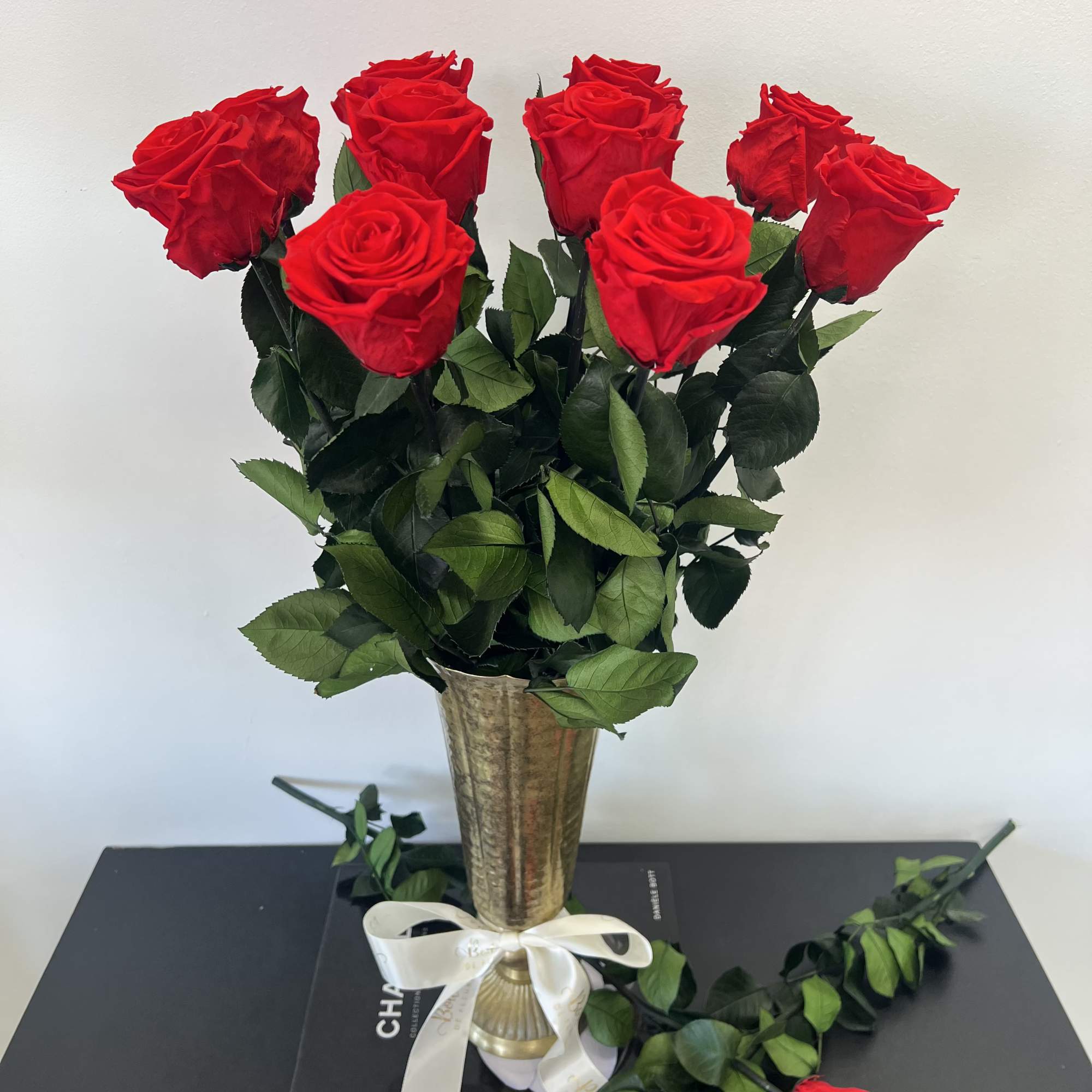 Elevate your space with our Luxury Love featuring a dozen preserved red