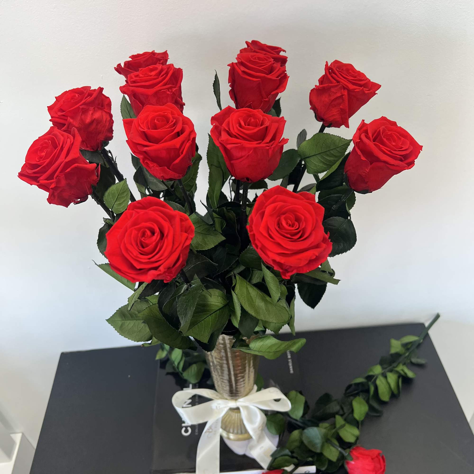 Elevate your space with our Luxury Love featuring a dozen preserved red, photo 2 of 4