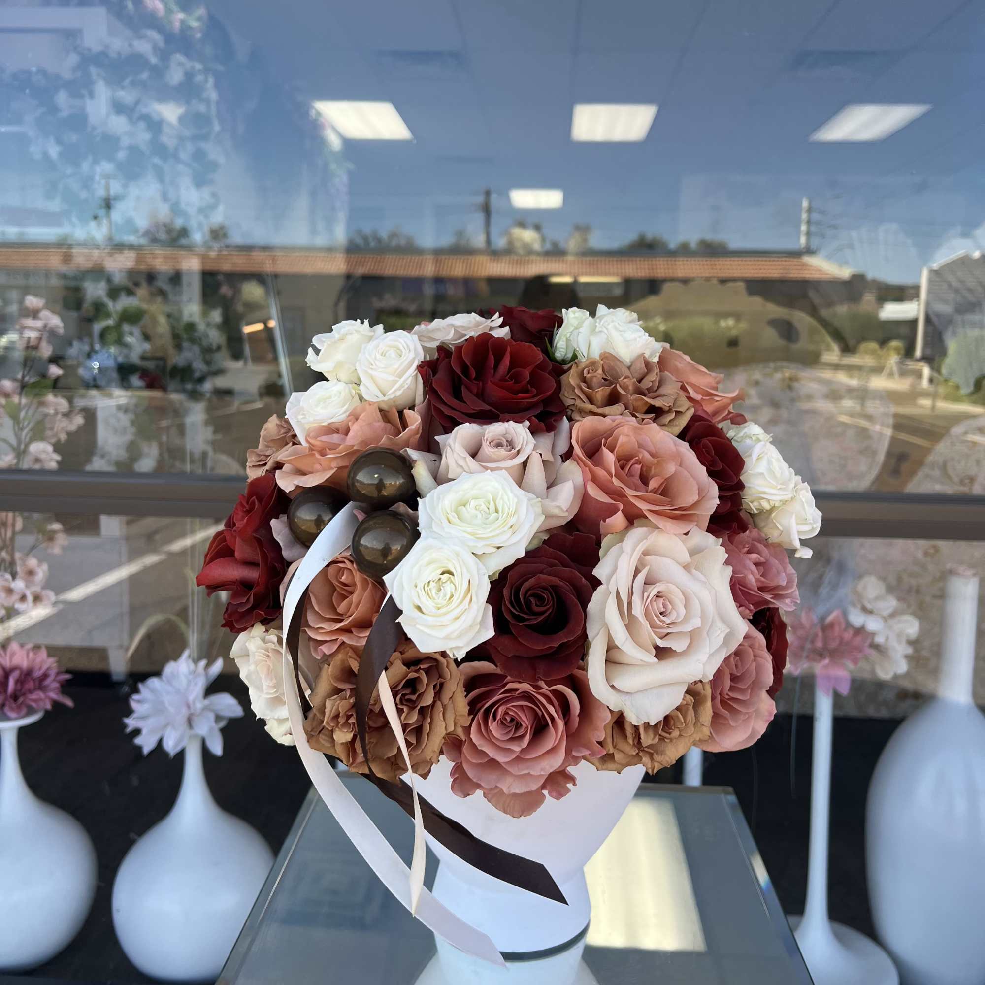 Cashmere Kiss is a luxurious rose arrangement featuring elegant shades of brown, photo 4 of 5