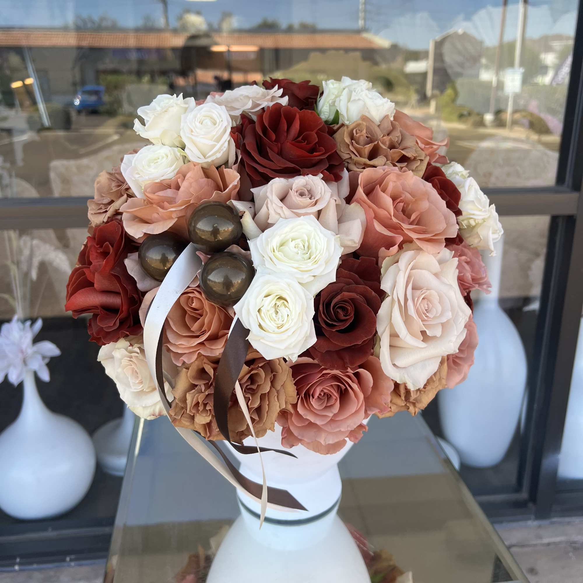 Cashmere Kiss is a luxurious rose arrangement featuring elegant shades of brown, photo 5 of 5