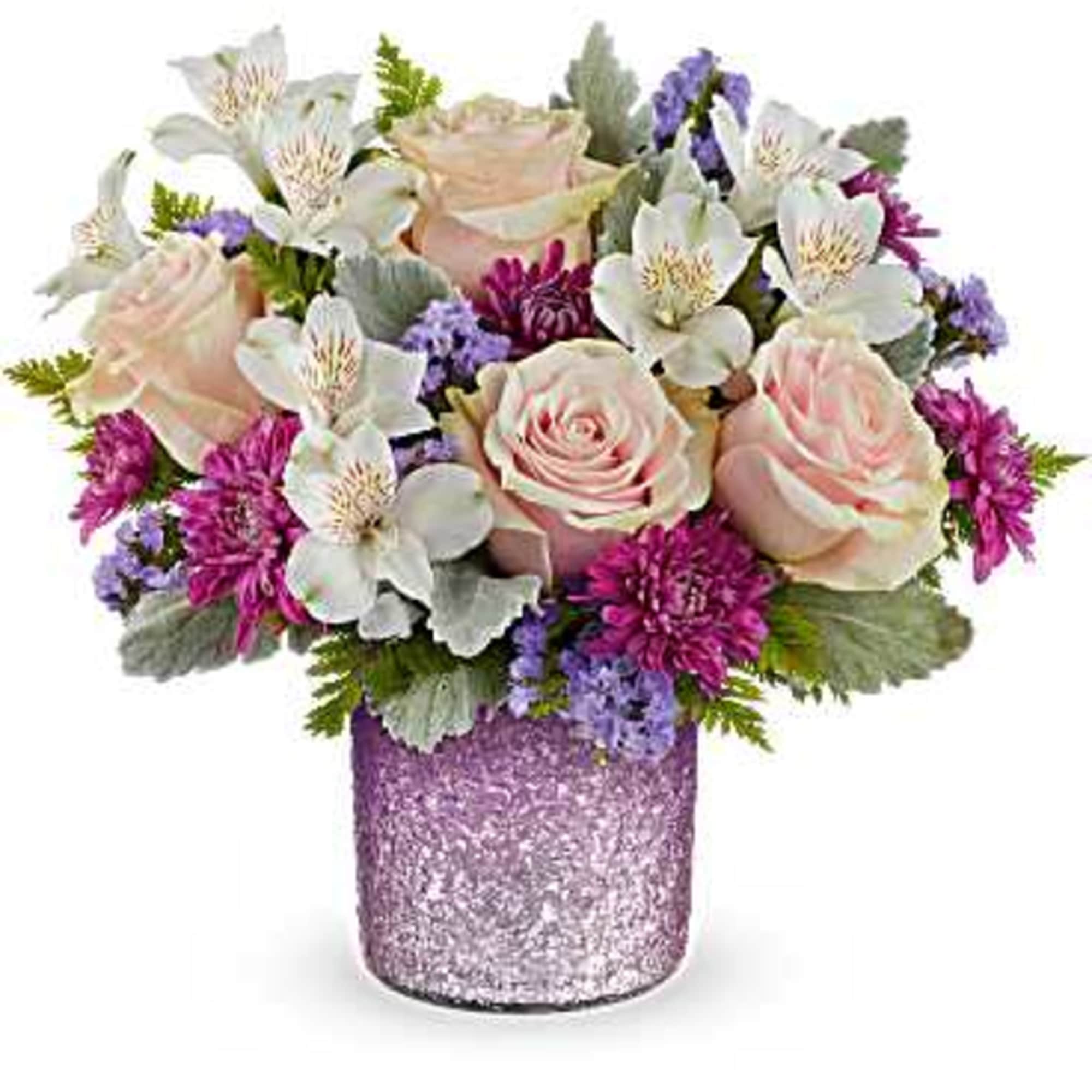 Pink roses and white lilies in a glittery purple vase