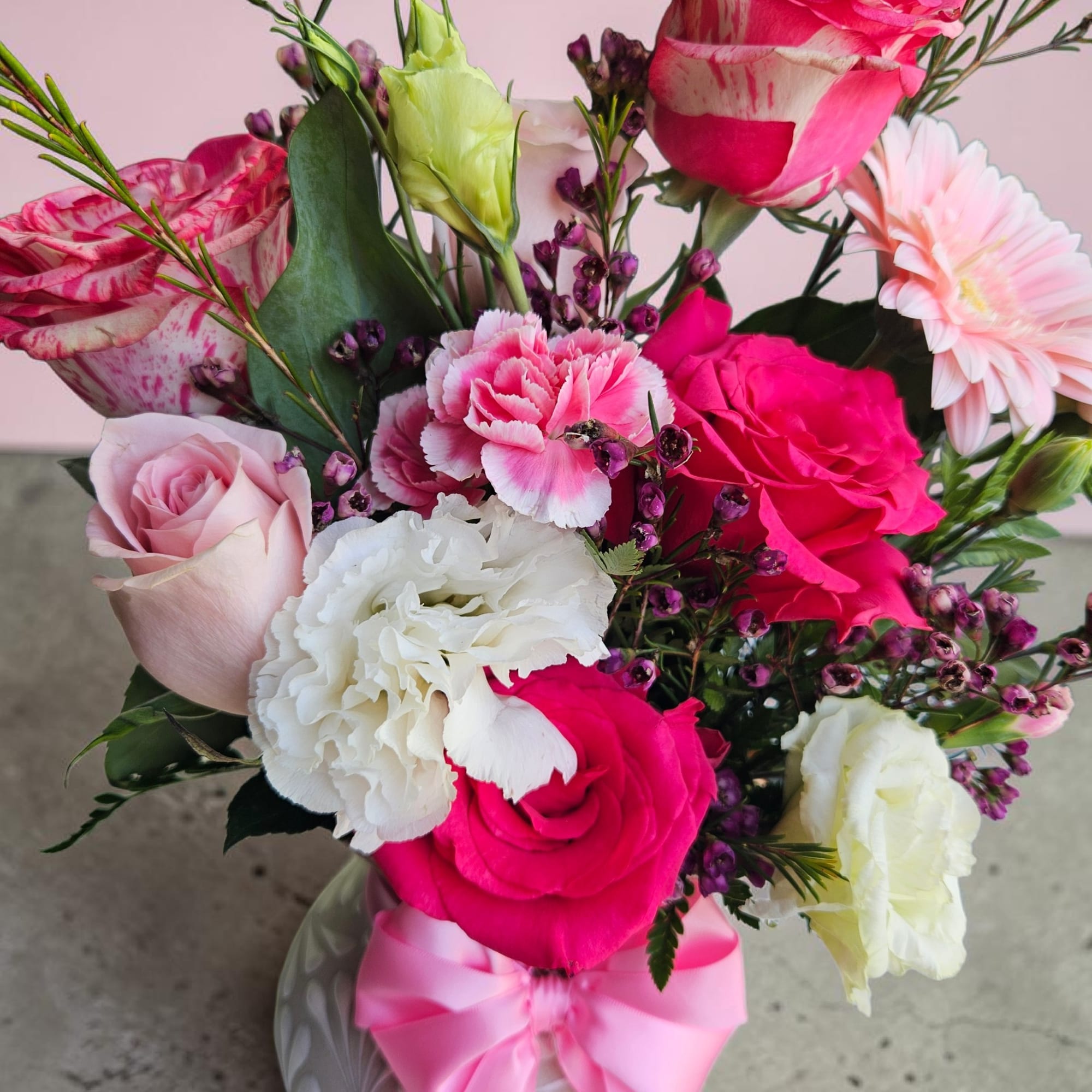 Bright, playful color takes center stage in this mixed flower arrangement-perfect as, photo 2 of 4