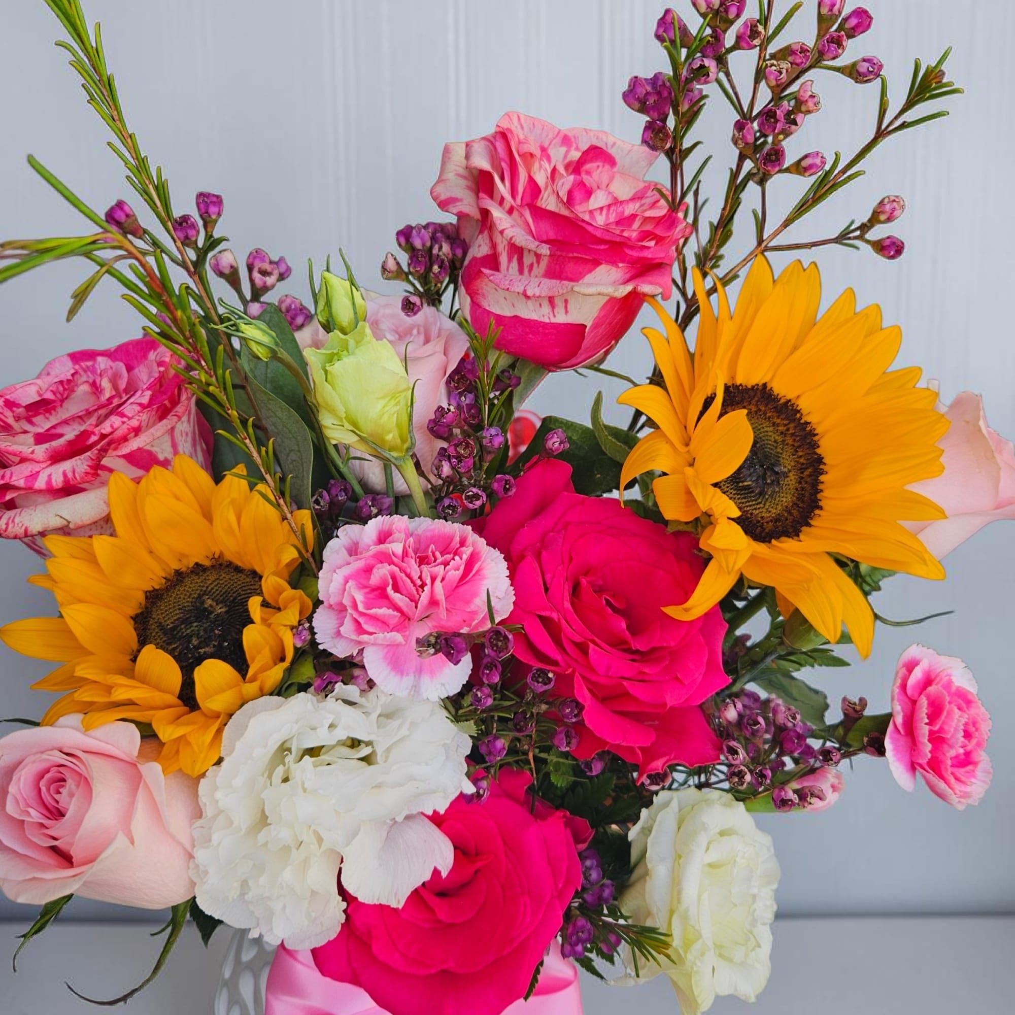 Bright, playful color takes center stage in this mixed flower arrangement-perfect as, photo 4 of 4