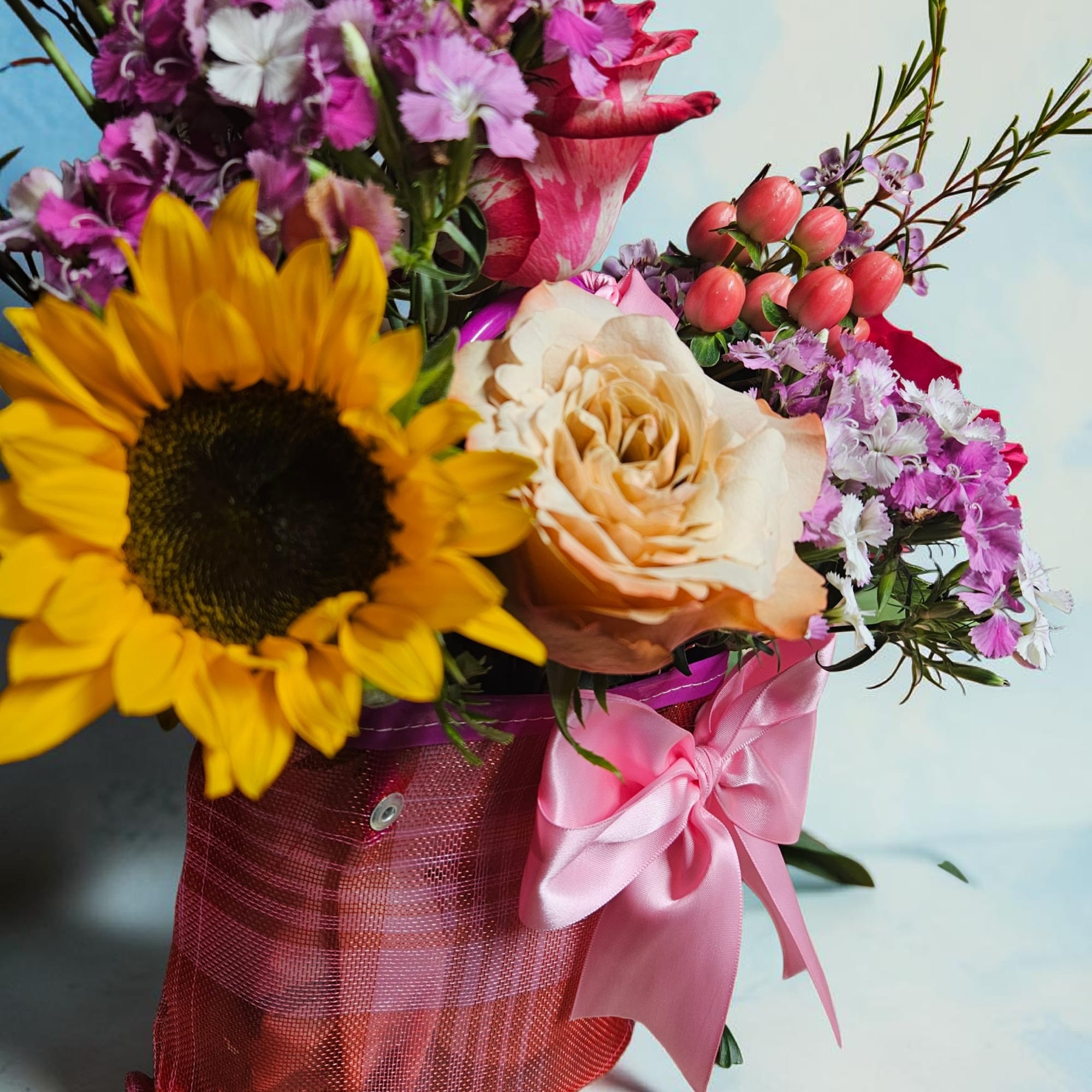 A bright sunflower crowns this Mini Mexican flower bag, making it a, photo 2 of 2