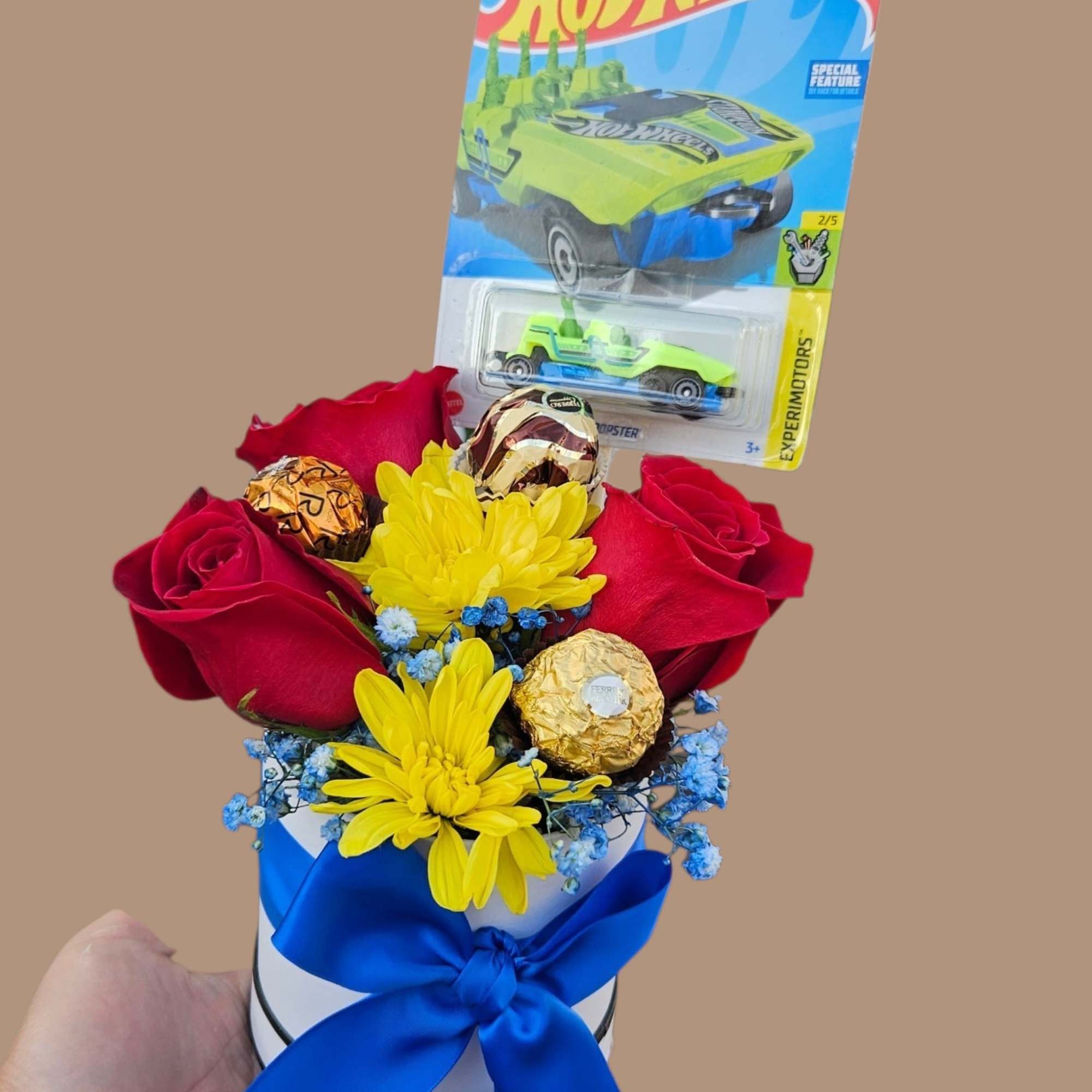 A cheerful, playfully themed gift arrangement that feels like a mini celebration