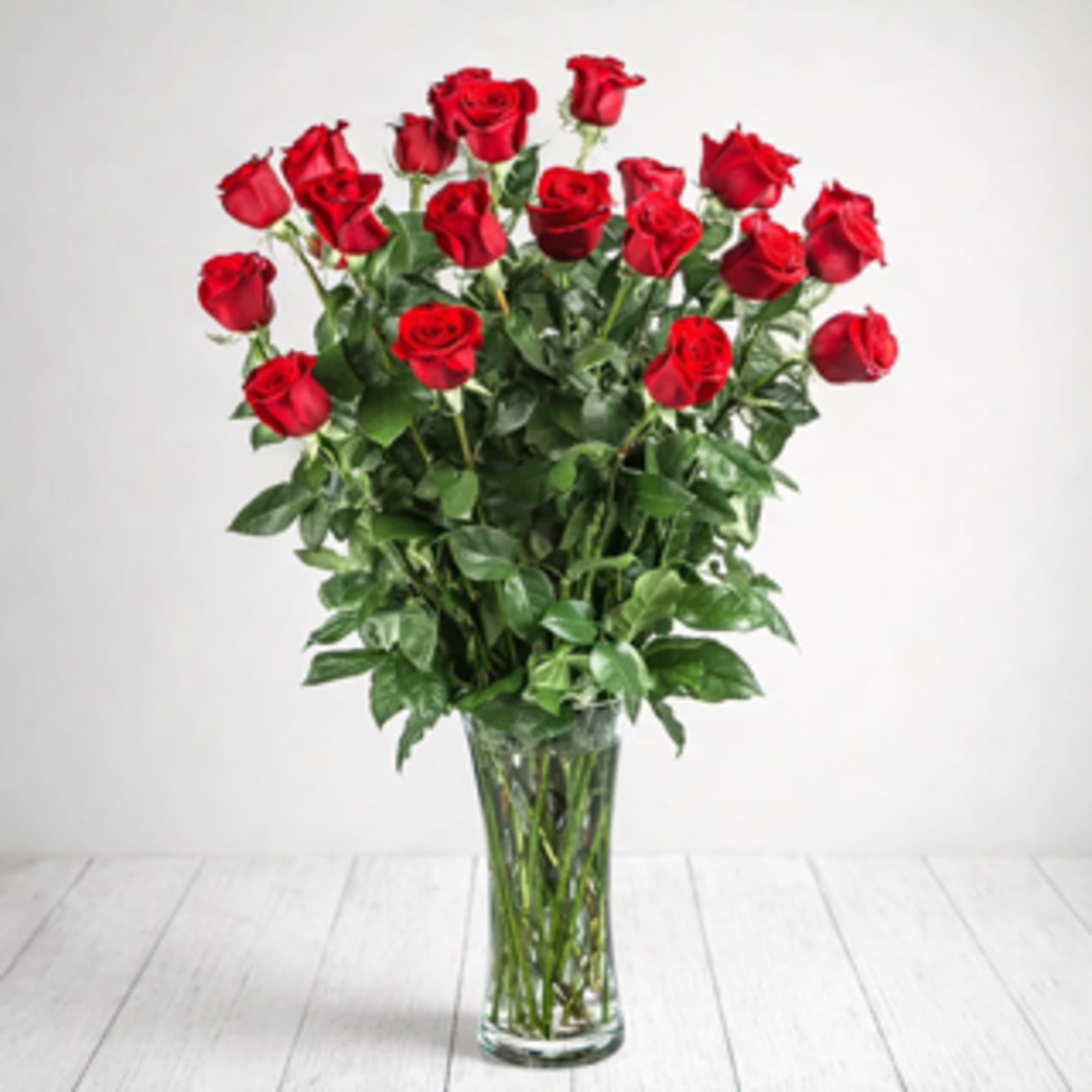 Product Description

This classic dozen red roses Valentine&rsquo;s Day flower arrangement in a