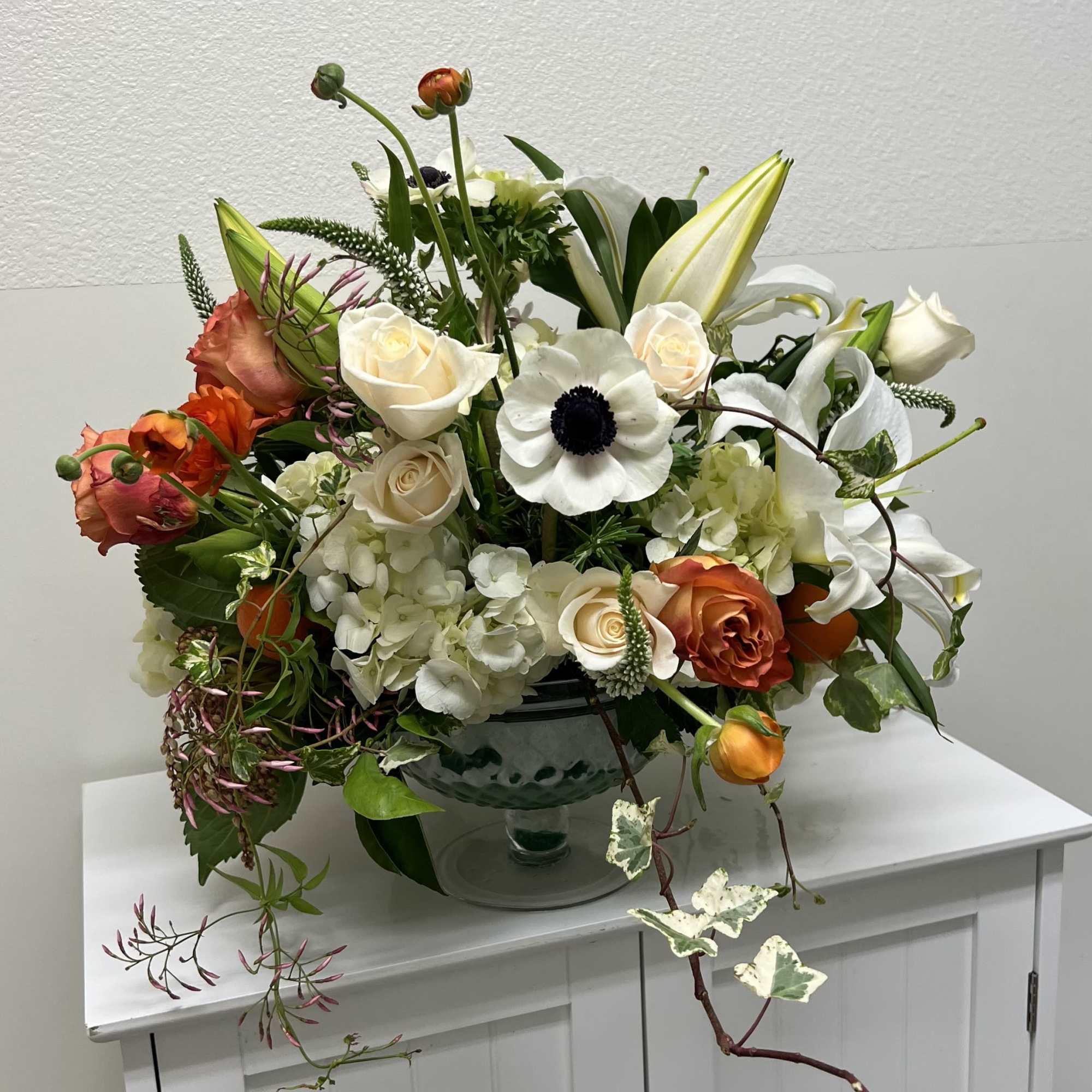 A serene palette of creamy whites punctuated by warm orange and soft, photo 2 of 2