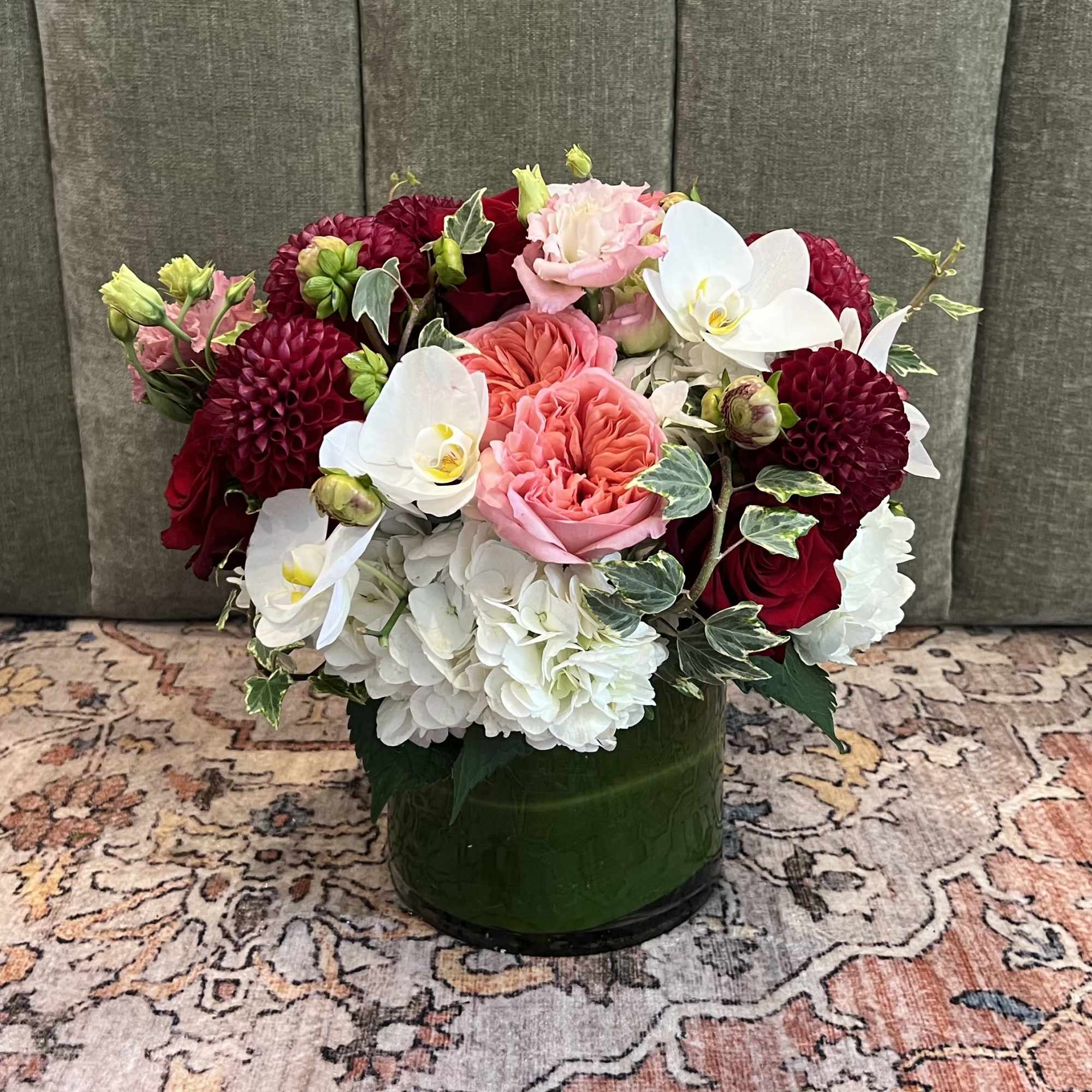 A lush, jewel-toned rounded arrangement designed to make her feel truly celebrated-perfect