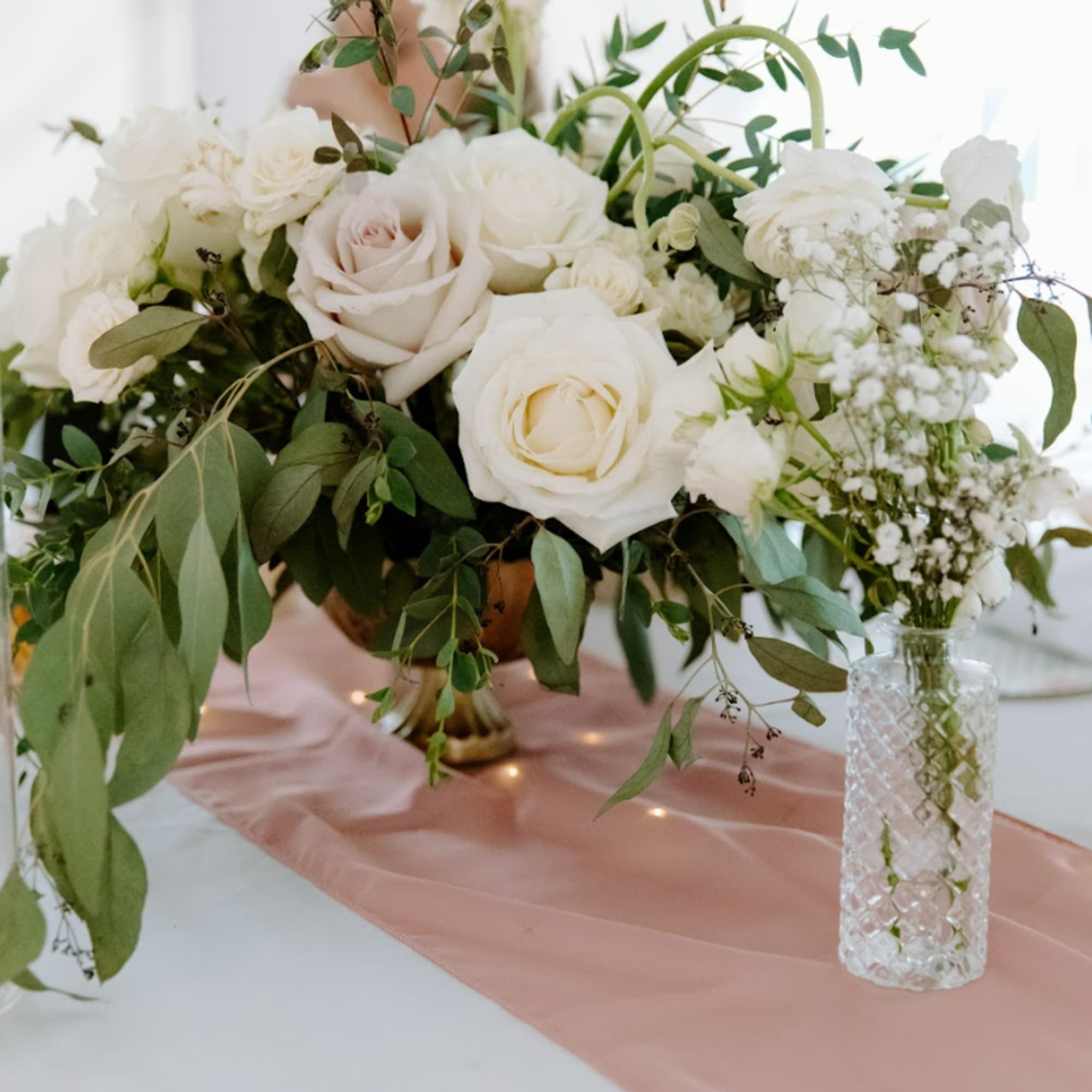 Transform your wedding reception or special event with our stunning, professional centerpiece
