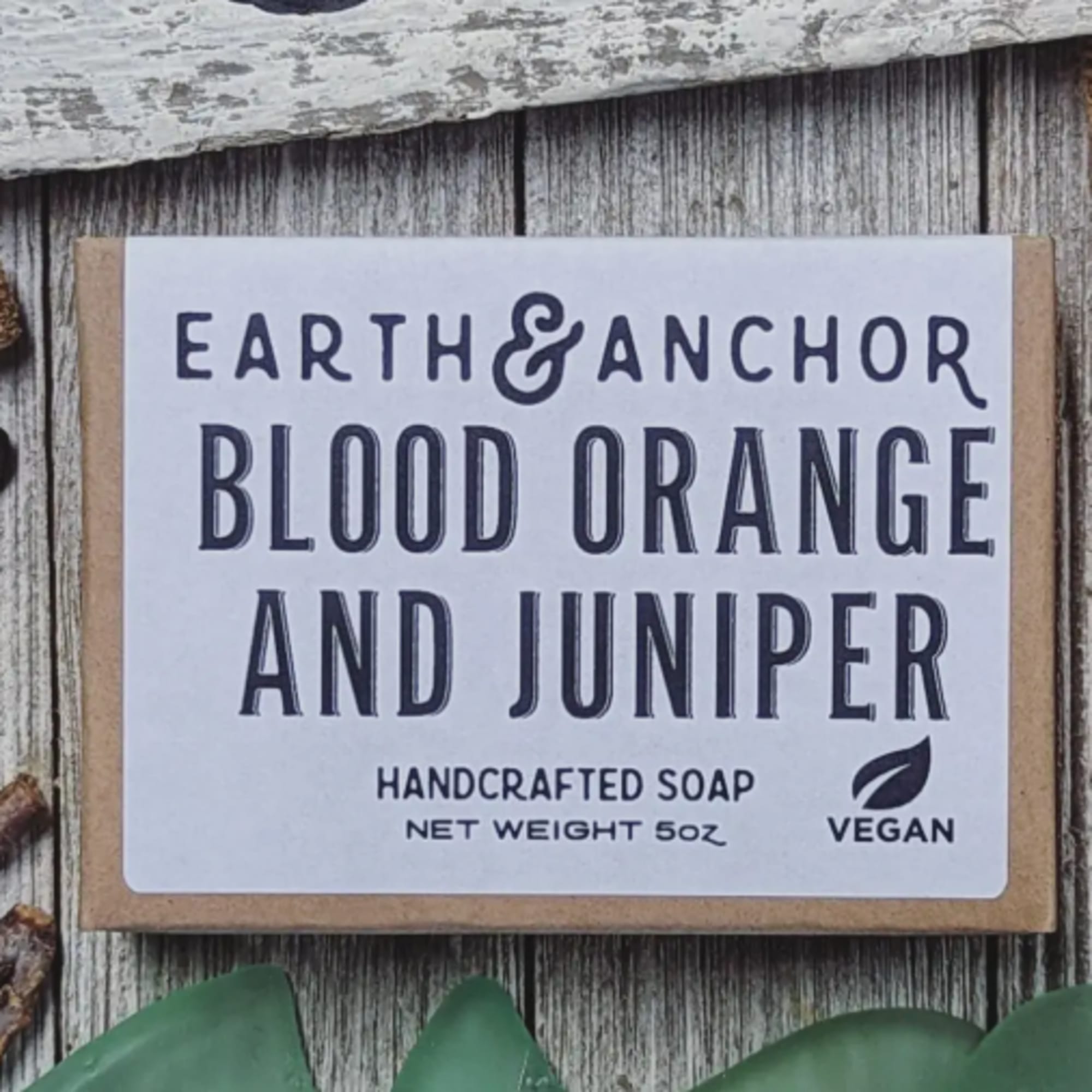 Boxed handcrafted soap labeled Earth & Anchor Blood Orange and Juniper