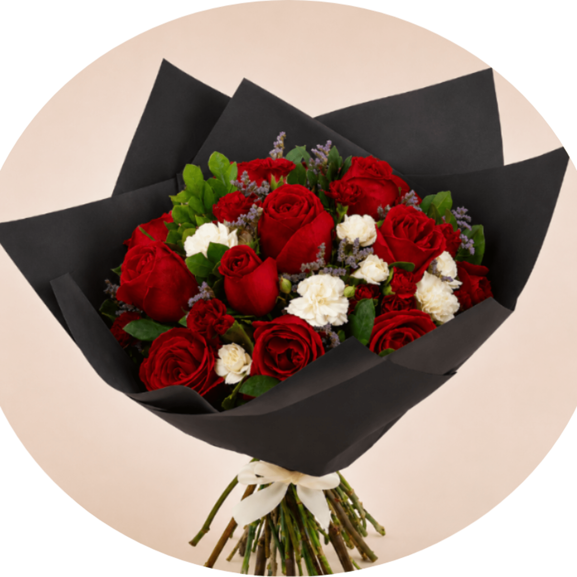 A dense cluster of velvety red roses framed by crisp white blooms