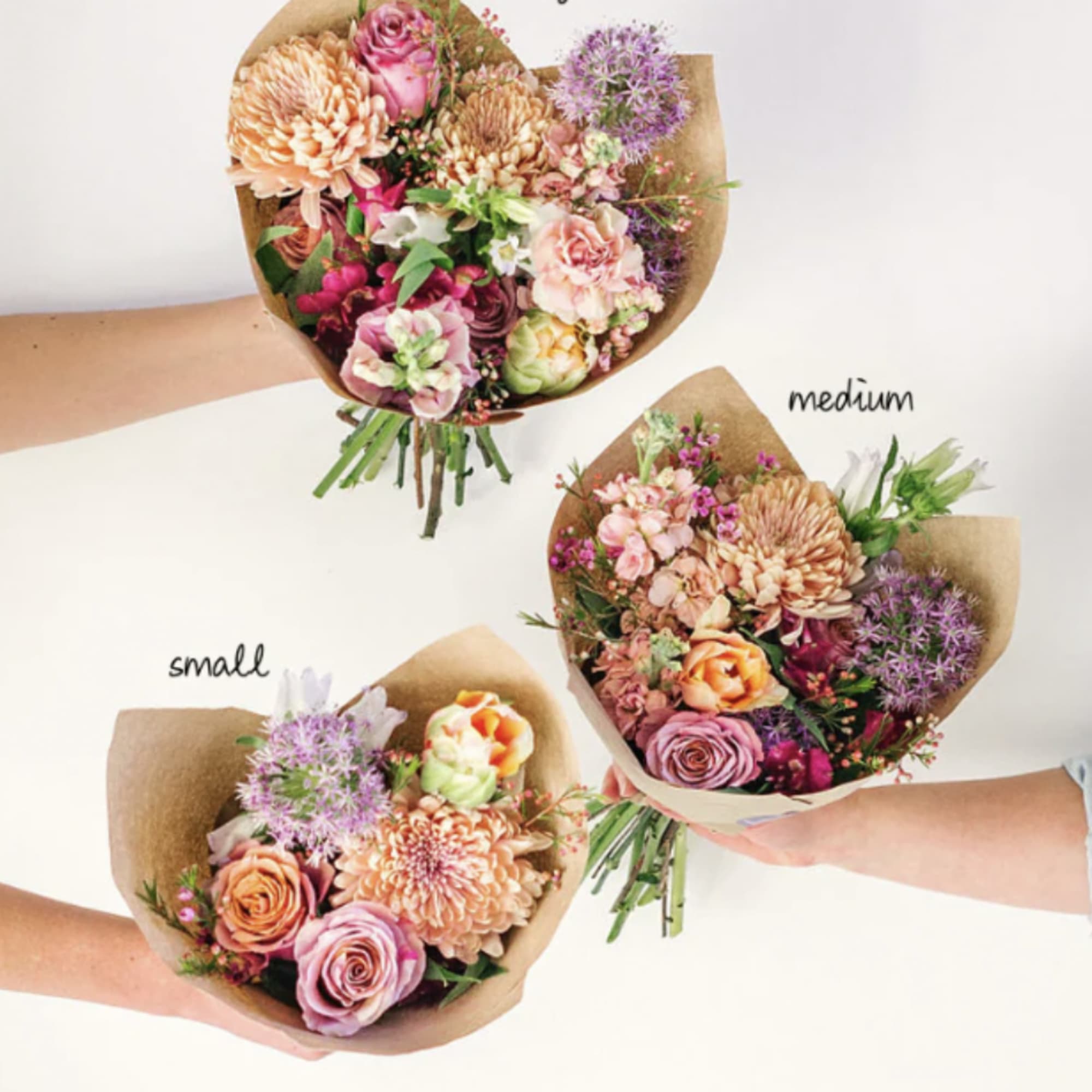 Three mixed flower bouquets wrapped in brown paper, labeled large, medium, and small.