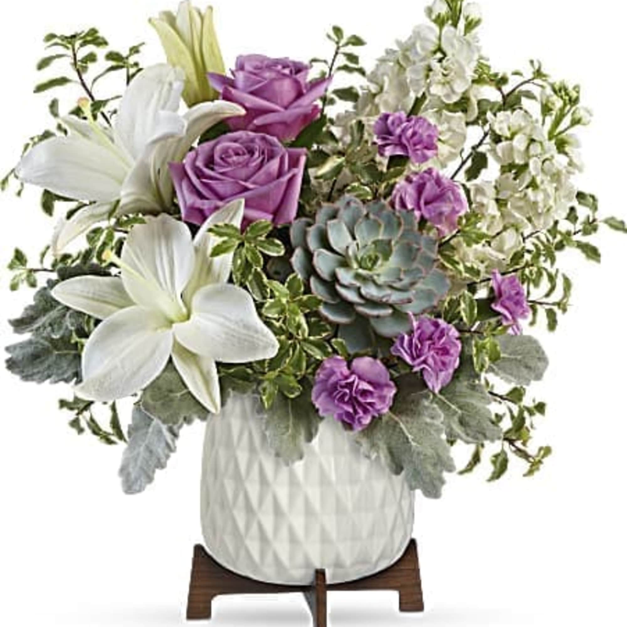 Straight out of a mid-century design magazine, this chic planter is the