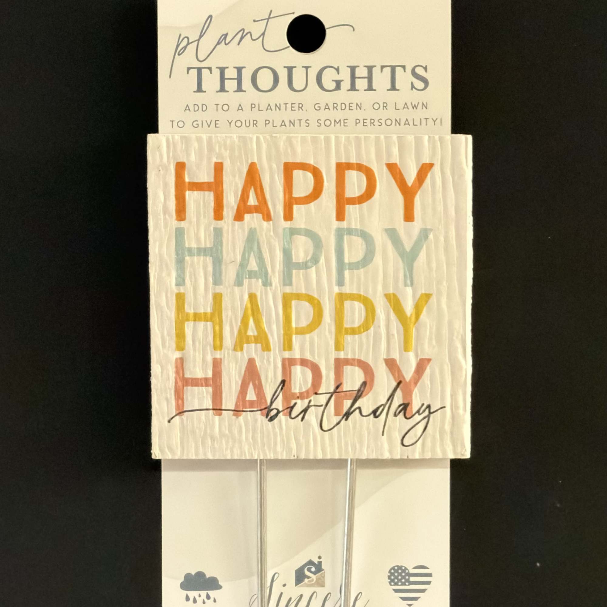 Packaged plant stake set with colorful "Happy Birthday" text