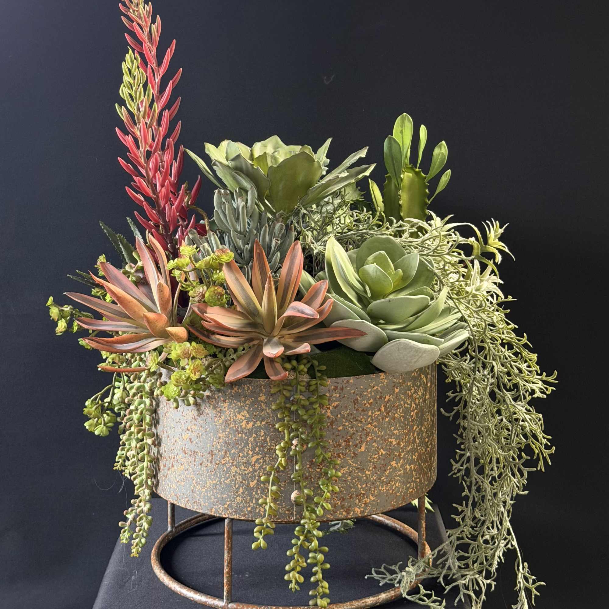 A sculptural faux succulent arrangement that reads like modern rustic home decor-perfect