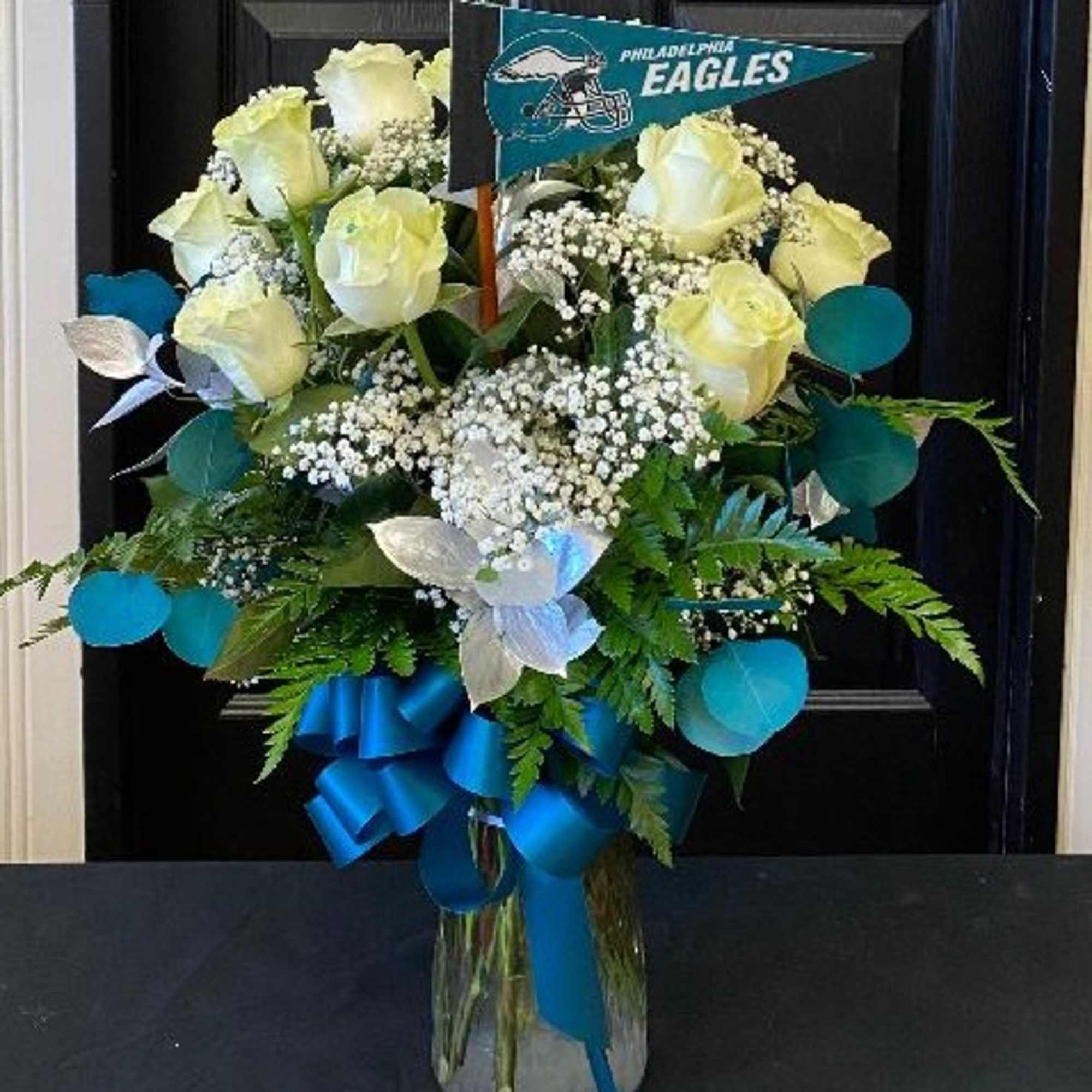 Two birds, one stone. 
Send our one dozen white roses with green