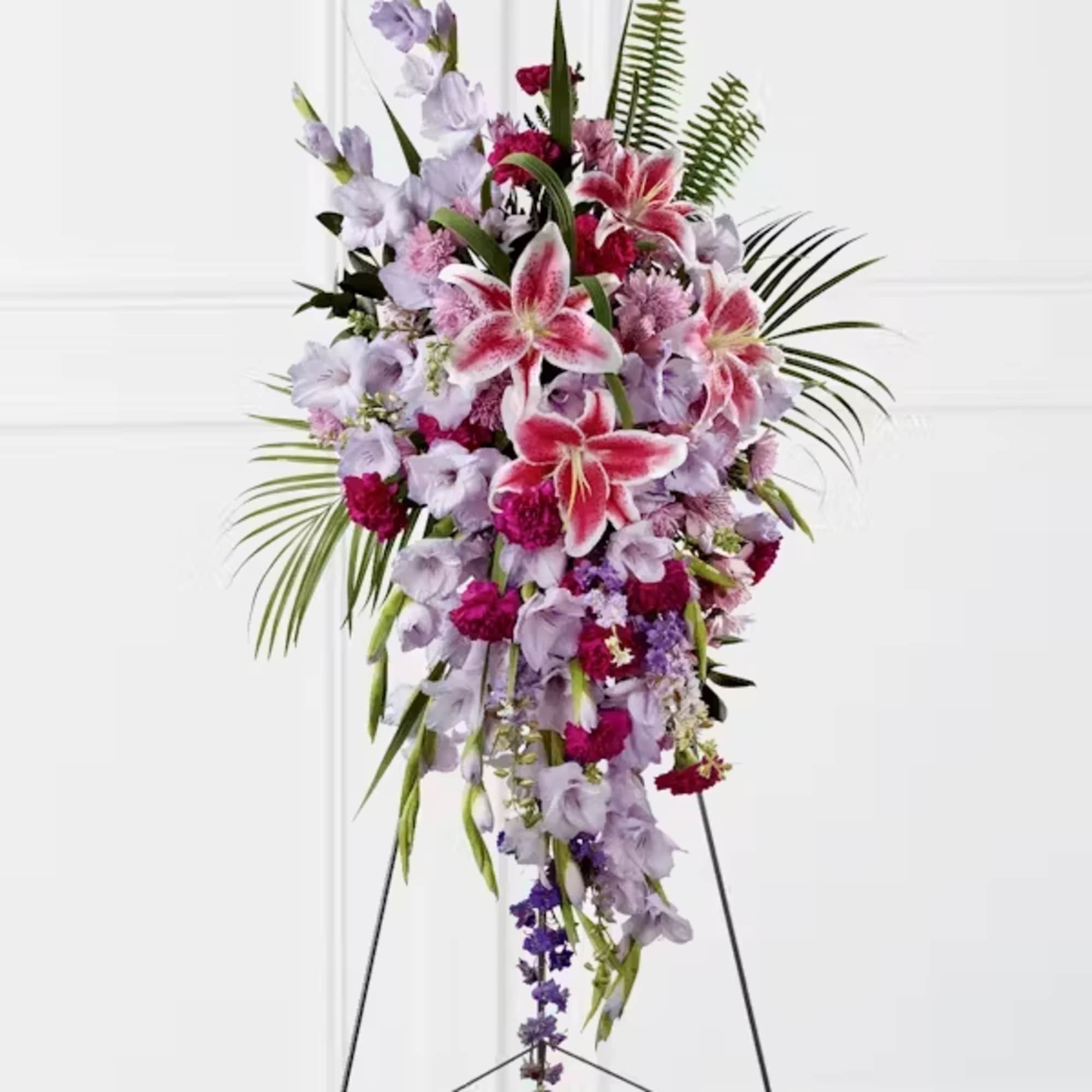 The Tender Touch Standing Spray creates an elegant display of beauty and
