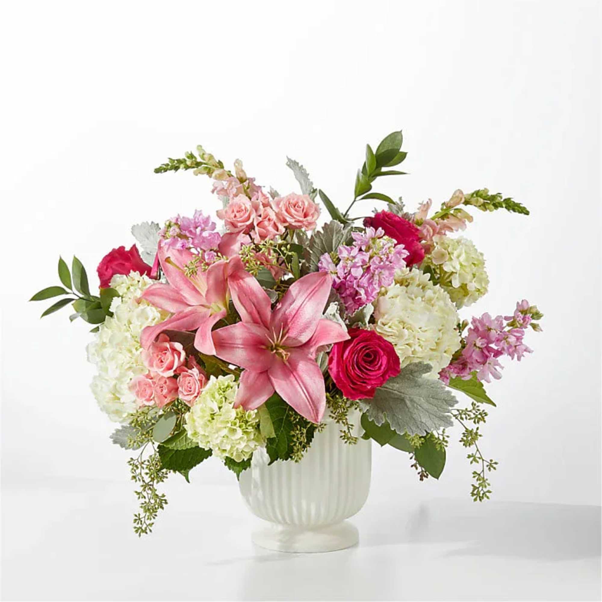 A spectacularly striking arrangement of hot pink, pale pink, white and green