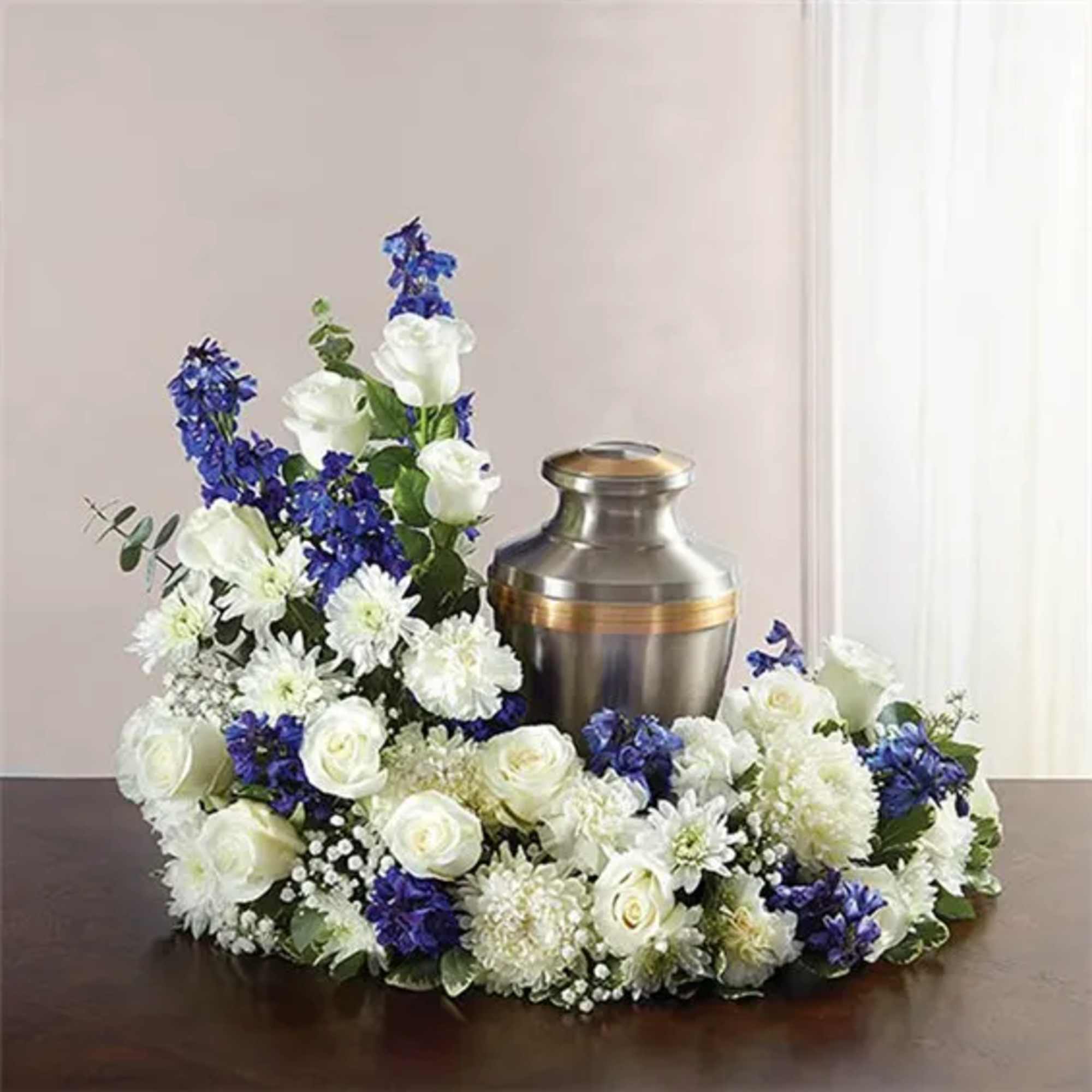 "Honor a life so beautifully lived. Our florists artistically hand-design an asymmetrical