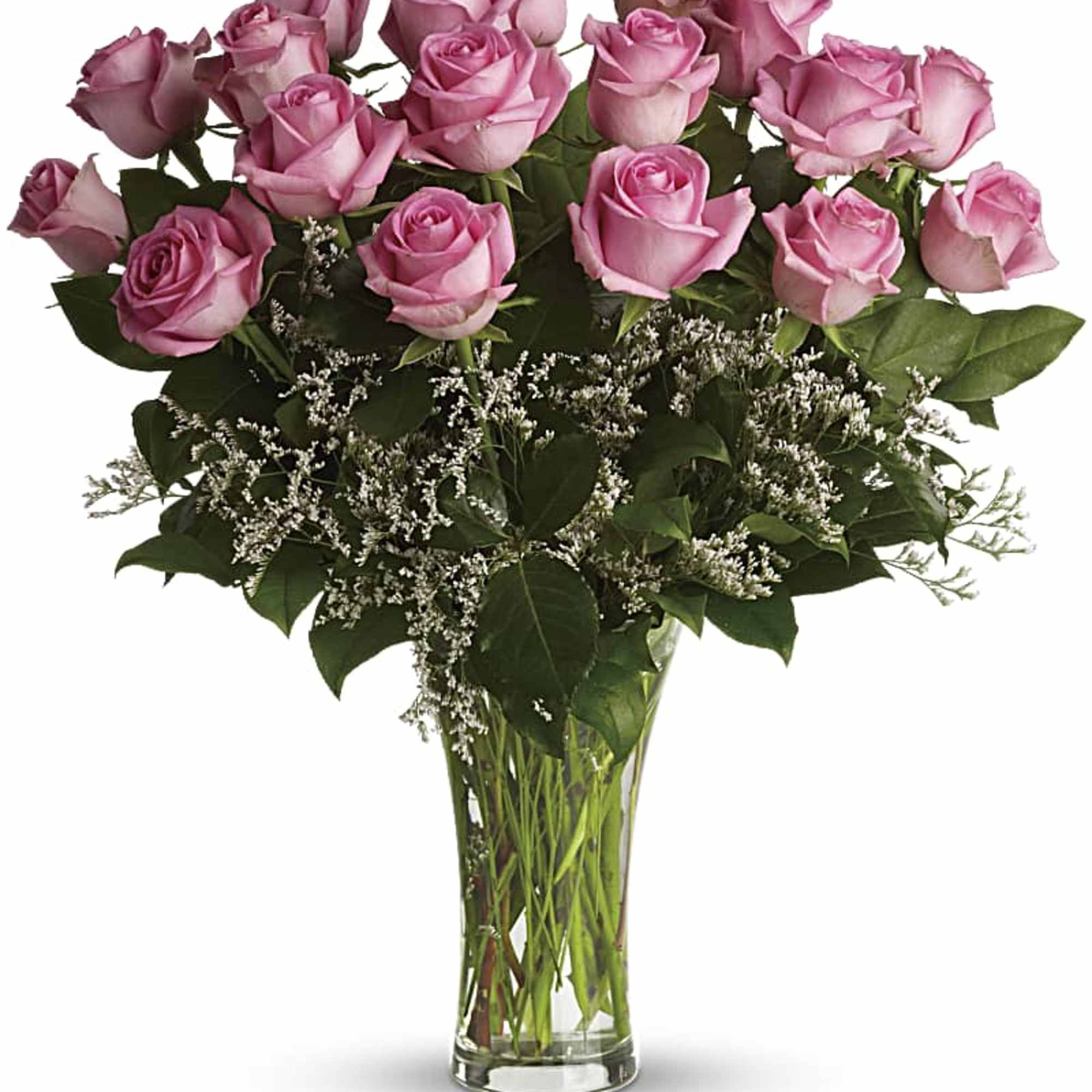Pink roses arranged in a clear glass vase