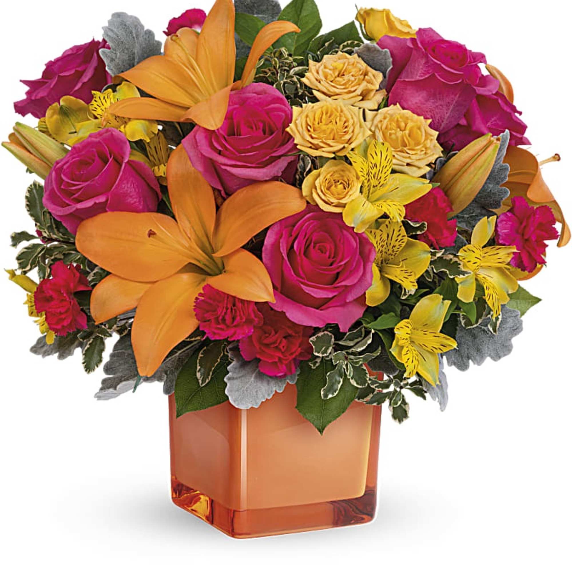 Bouquet of pink and yellow flowers in an orange glass vase