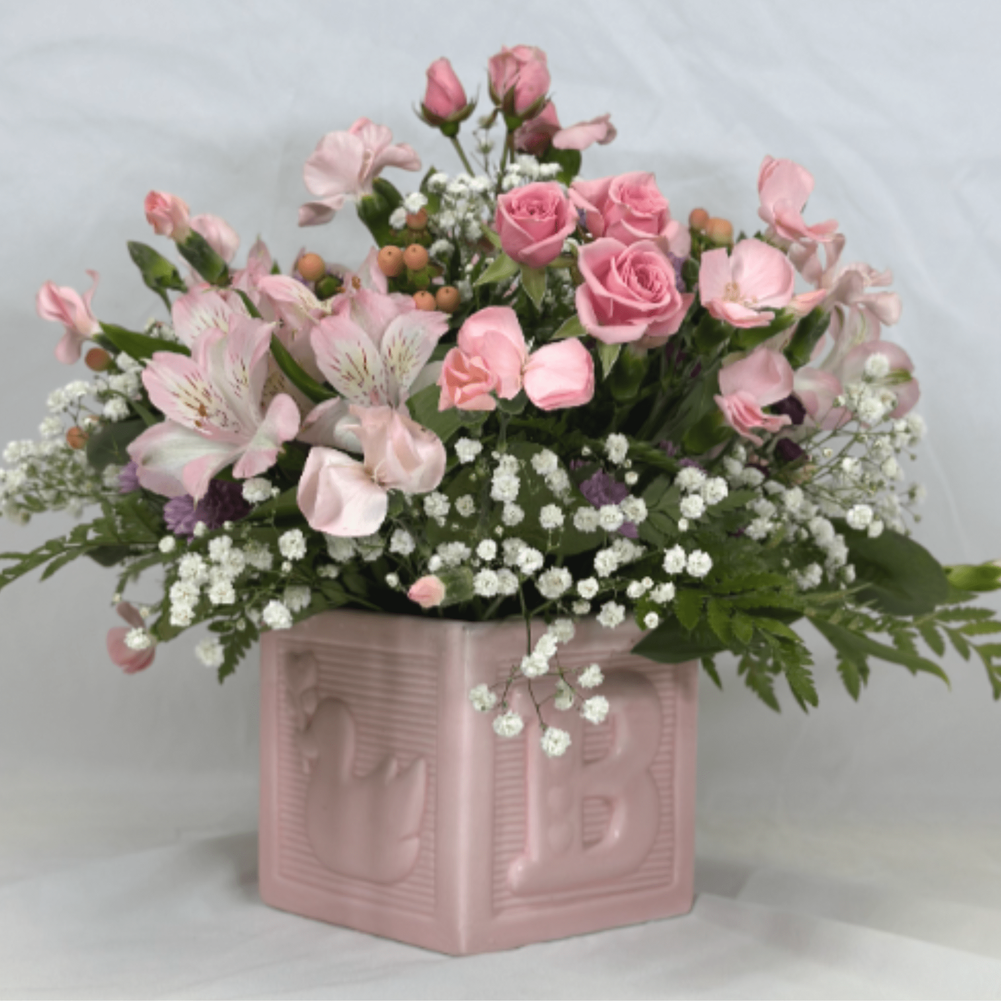This is a delightful arrangement for a new mom or dad! It
