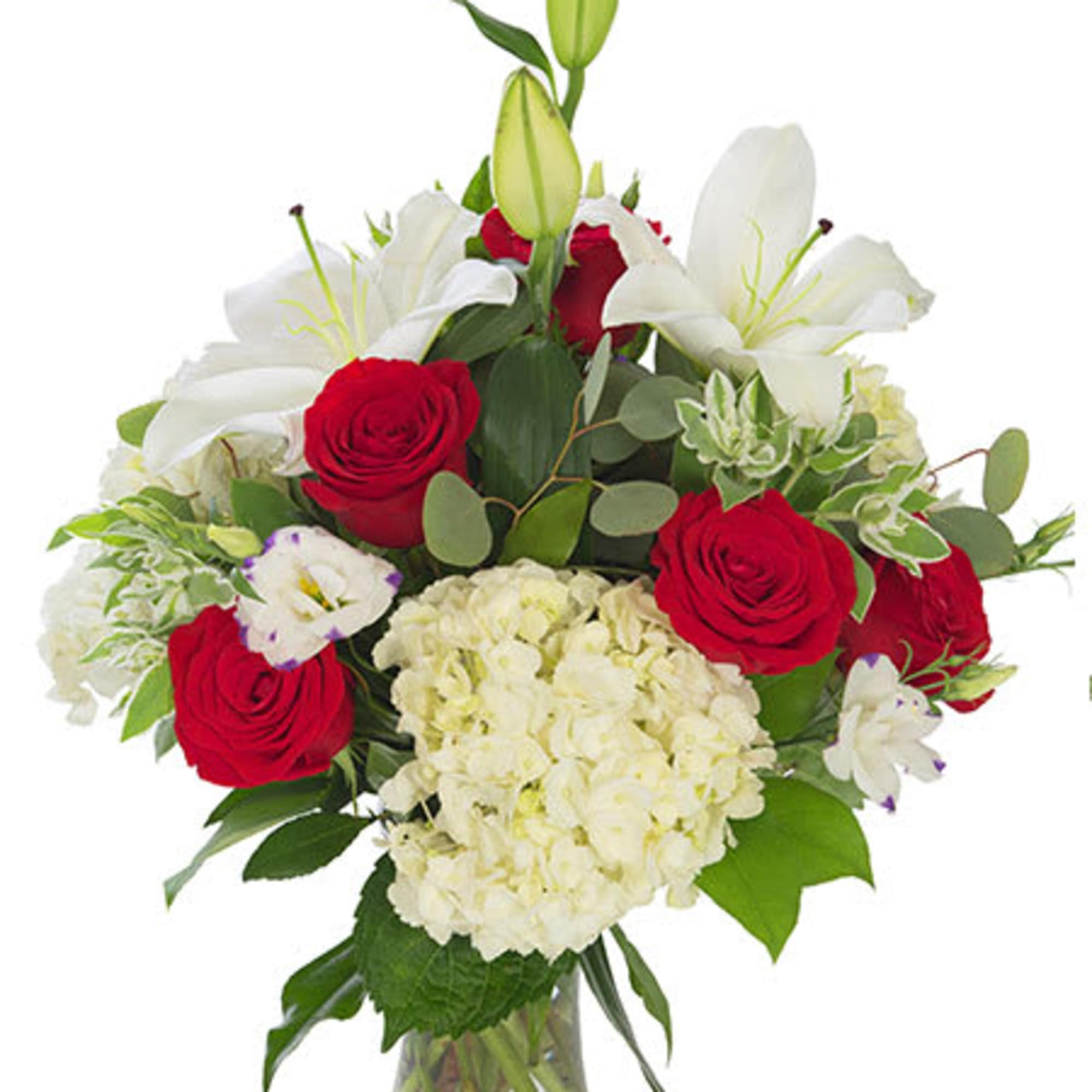 Red roses and white lilies in a clear glass vase, photo 3 of 4