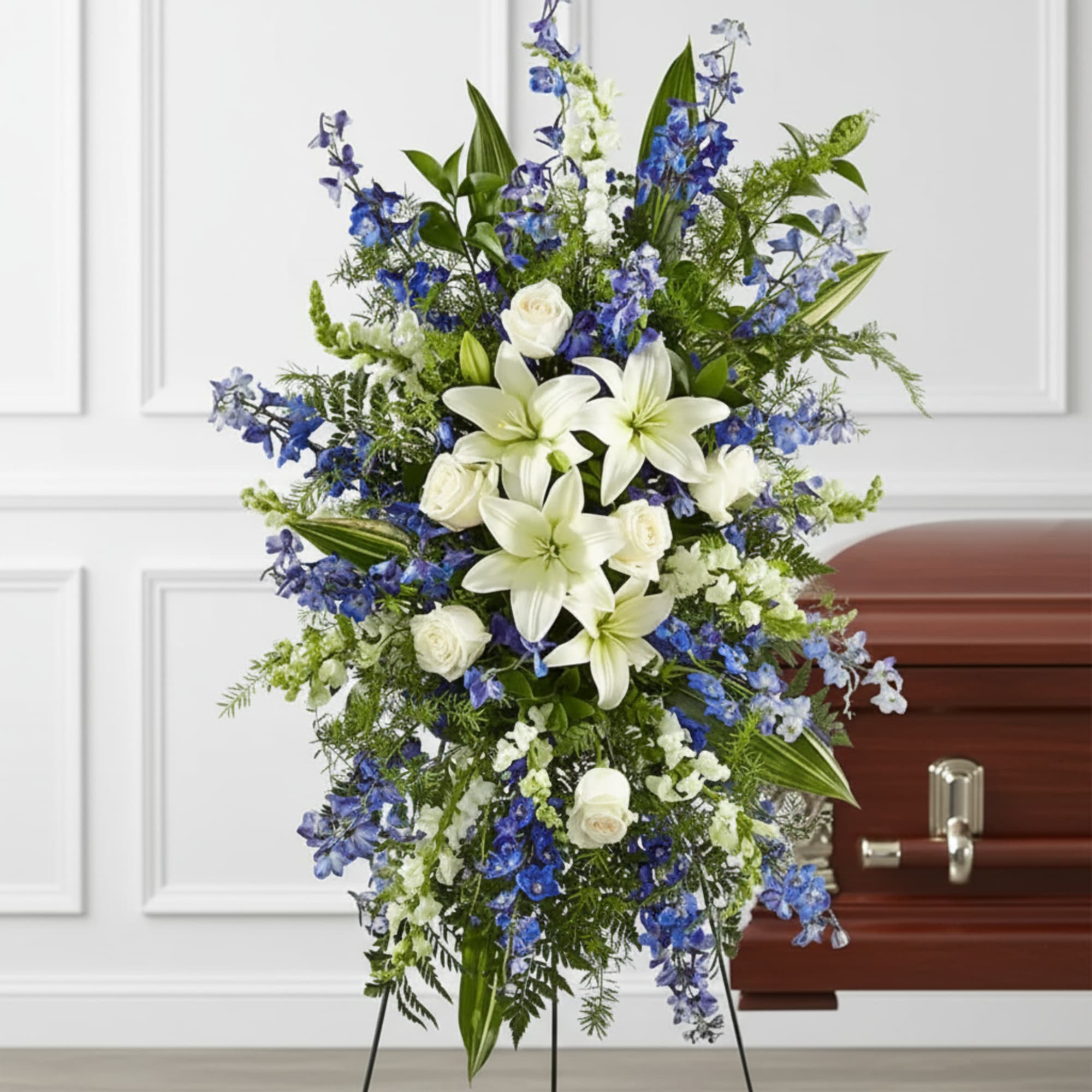 A collection of bold blue flowers shares a tribute that words cannot